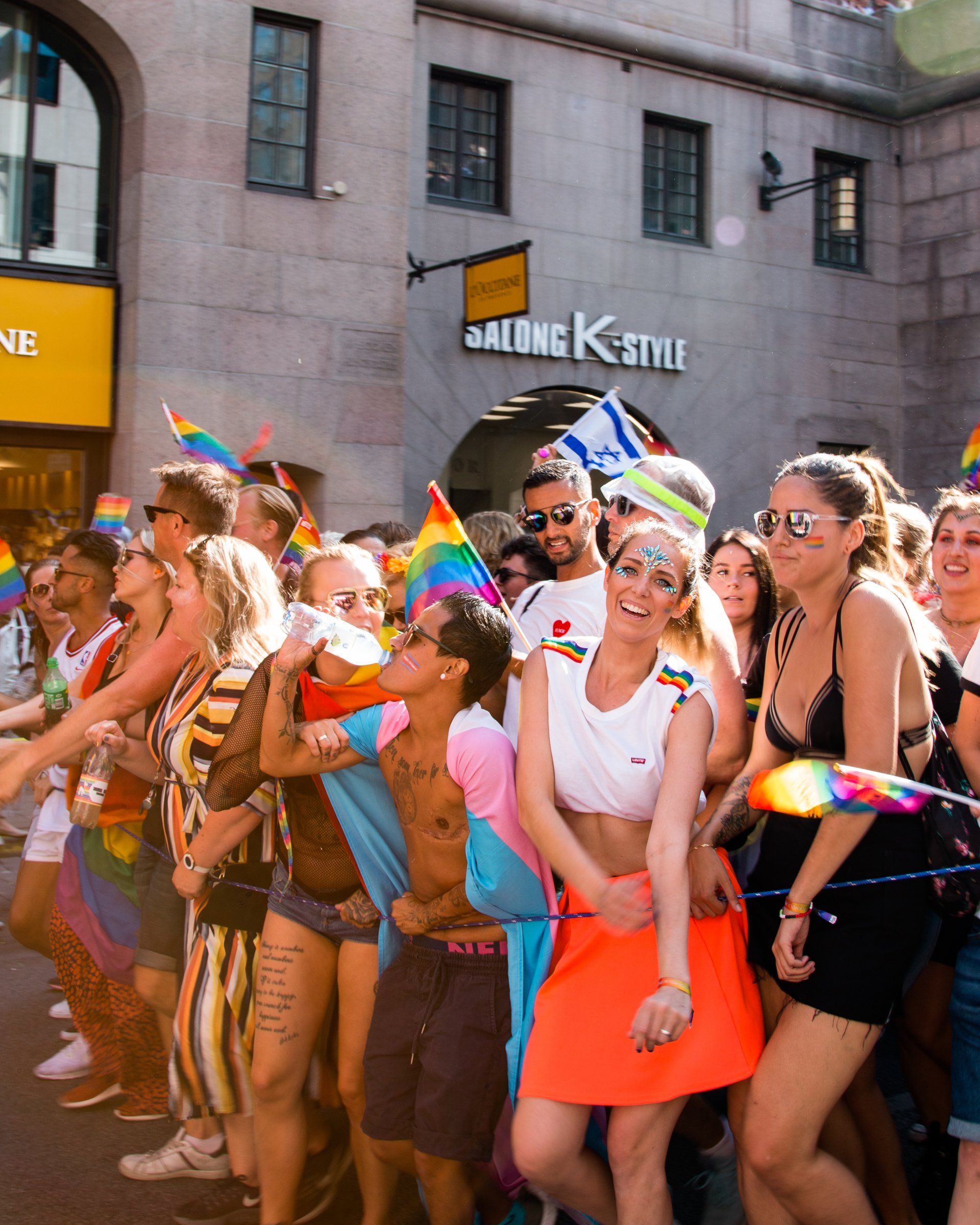 Gay Pride parade people smiling 