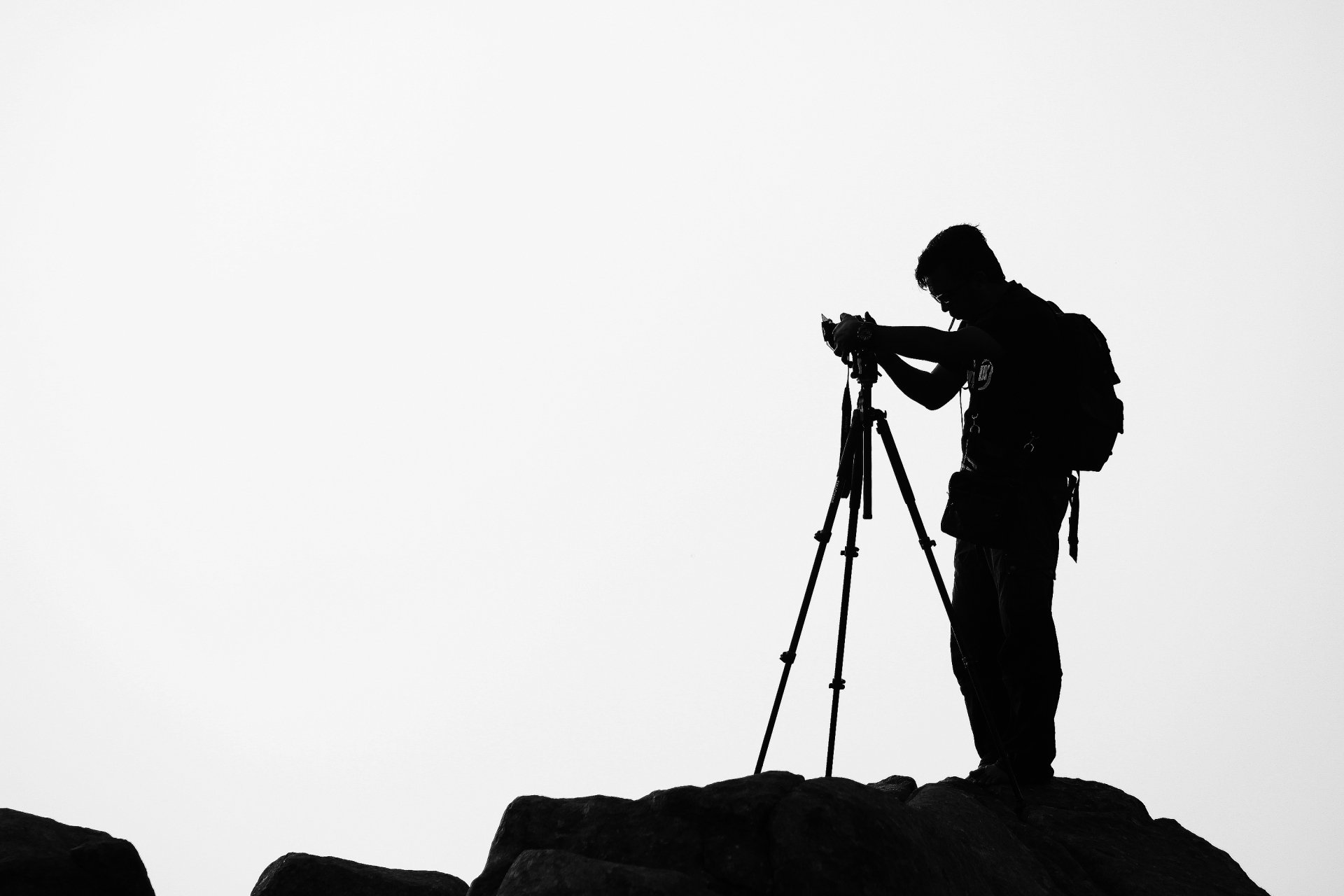 a person with a tripod