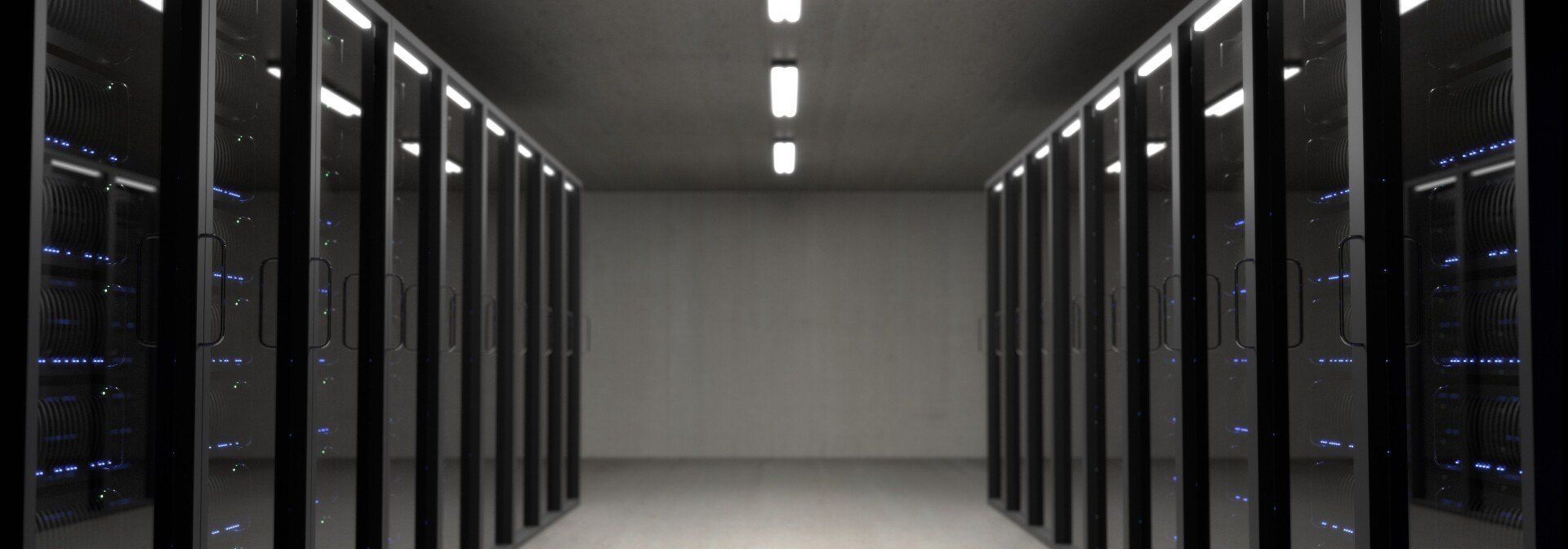 a short corridor with black metal doors along either side