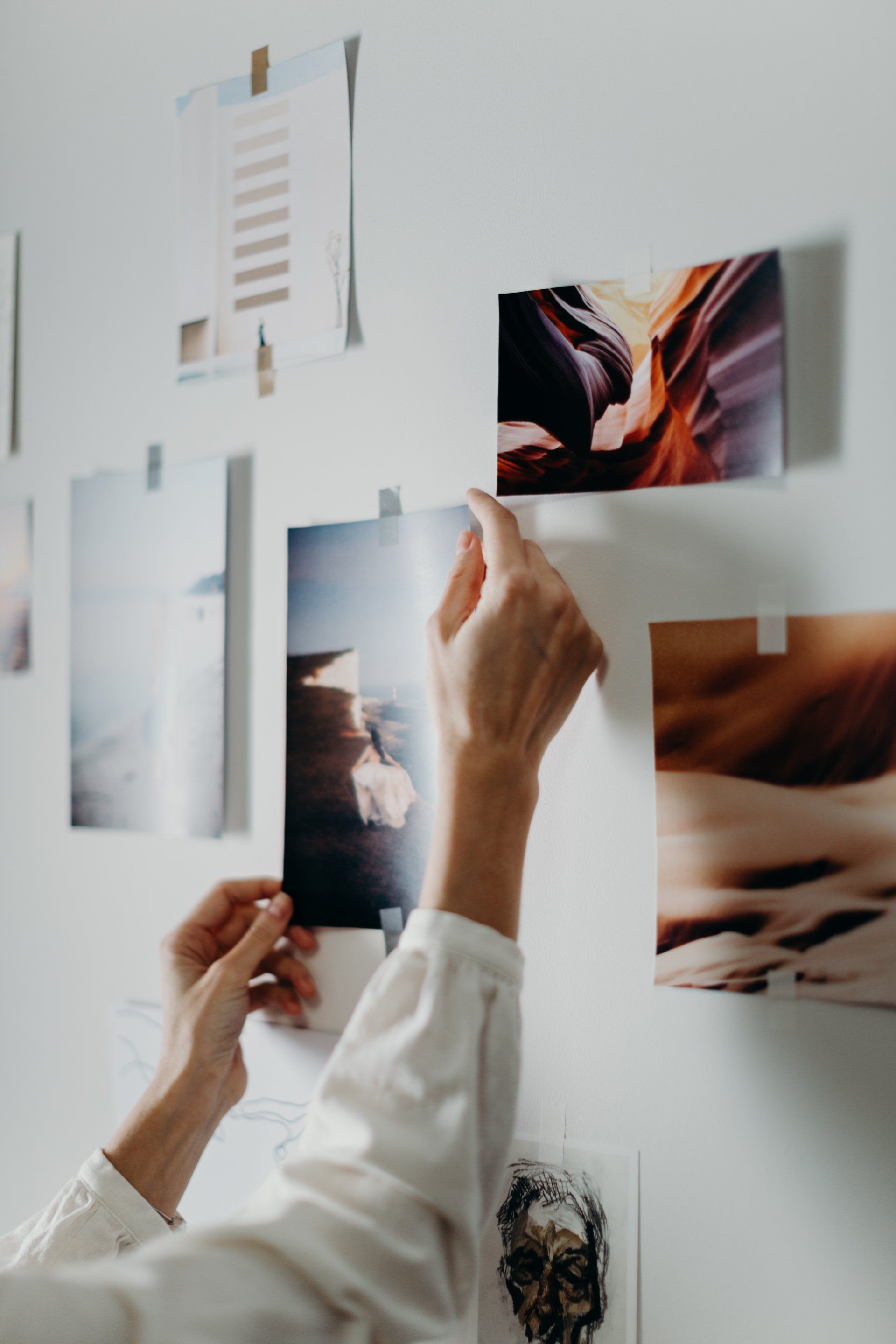 a person is holding a roll of film in their hand .