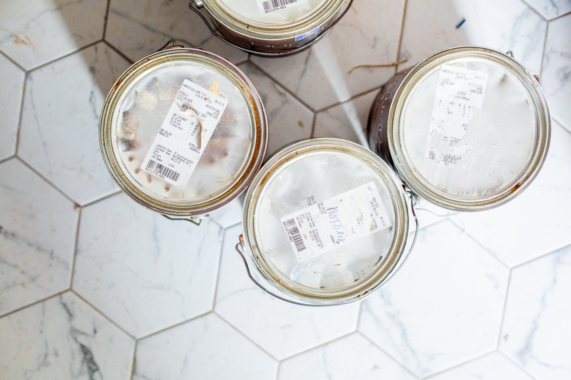 paint cans from Hawaii's best painting services