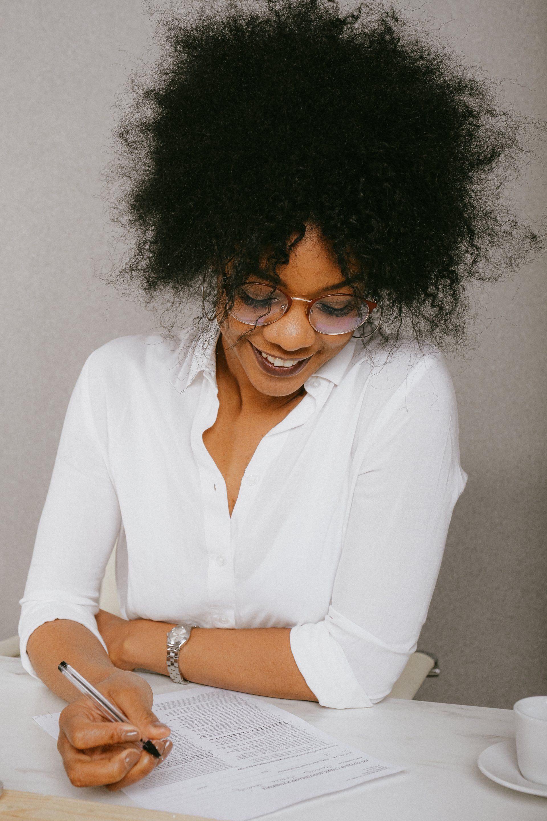 Finalising a rewarding plan management business deal with assurance. Confident lady signing a contract, advancing her plan management business transaction.