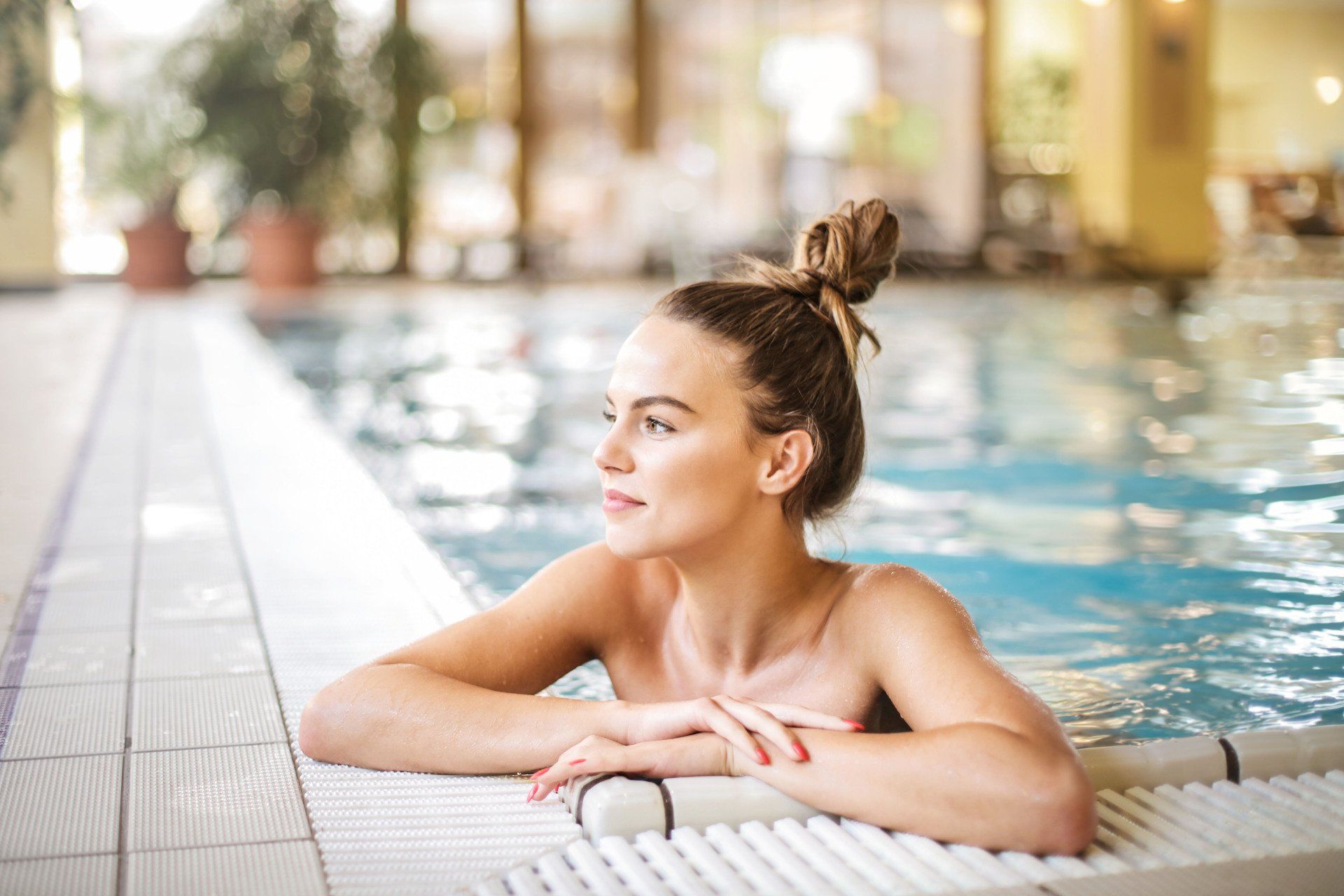 swimming and lounging in the inground pool.
