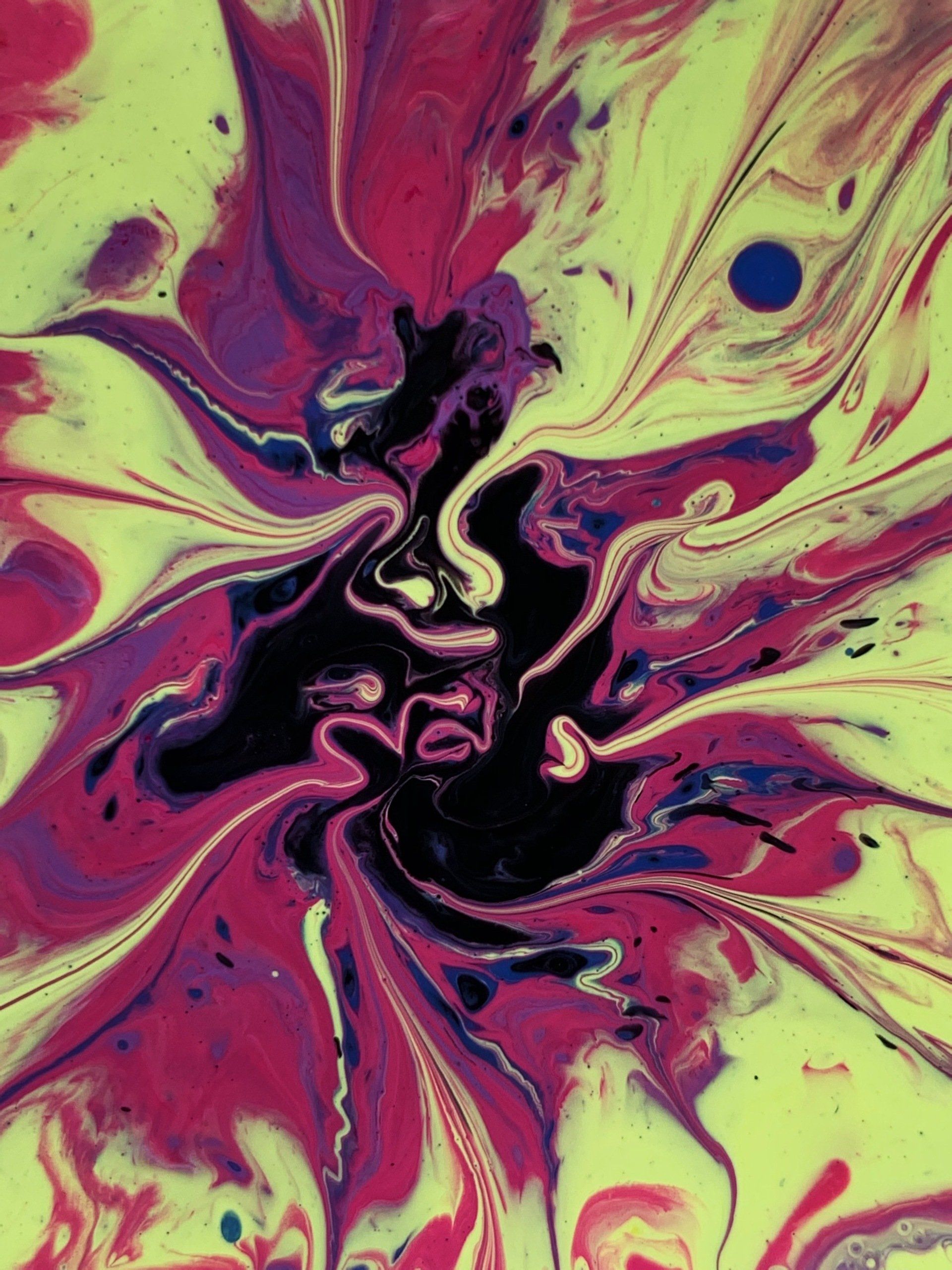 A close up of a colorful swirl of paint