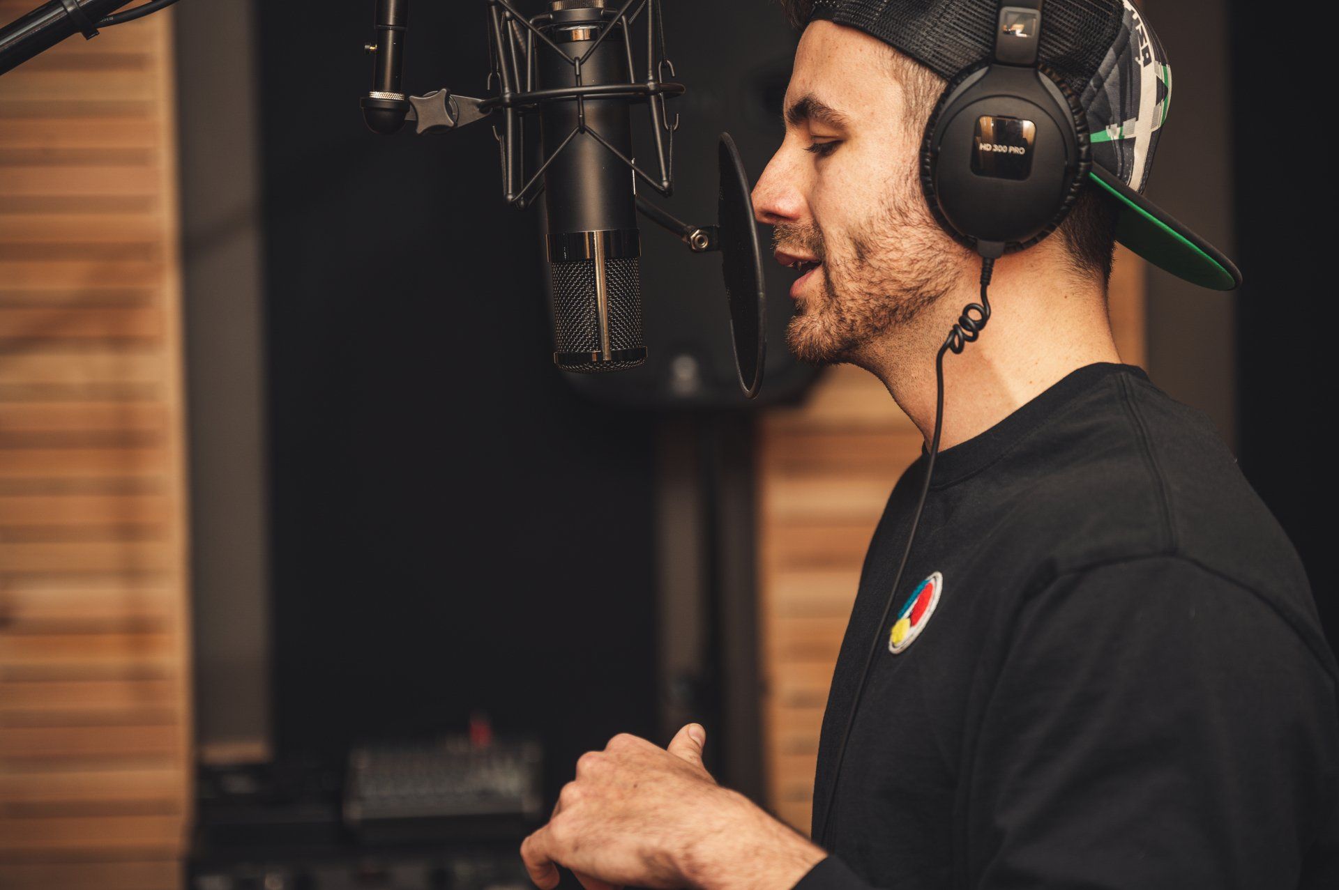 Music Student Recording Audio Into a Studio Mic