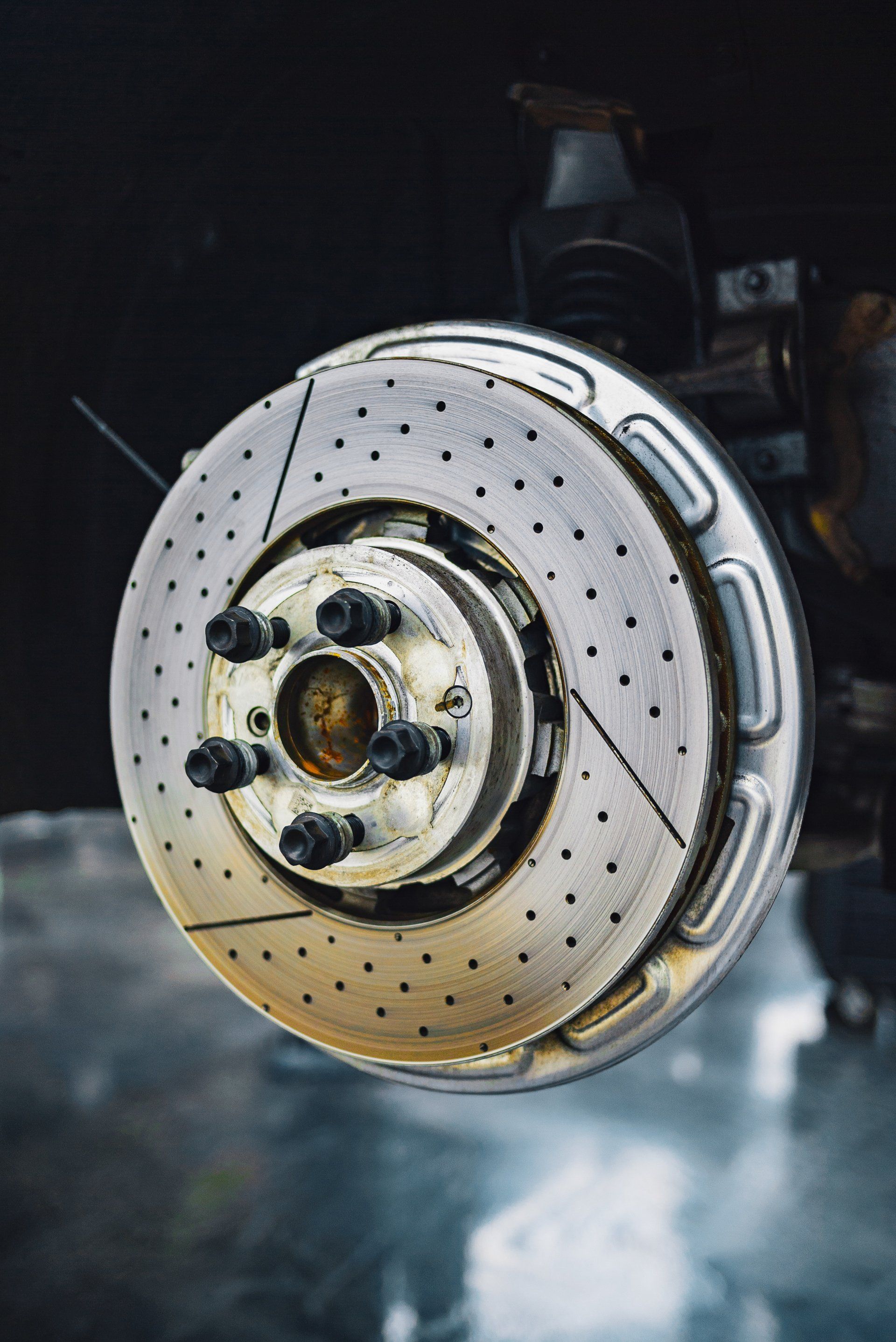 a close up of a brake disc on a car .
