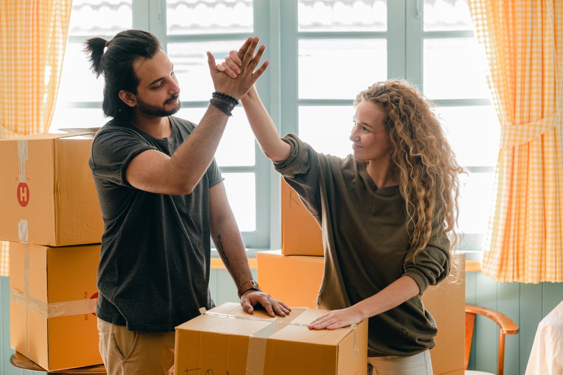 Couple celebrate moving into new house after getting a mortgage