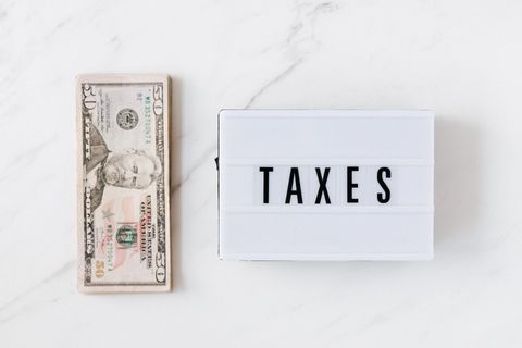Dollar bill & taxes