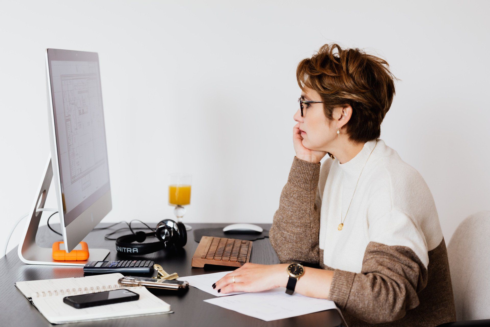 A designer working on a dental office design on their computer