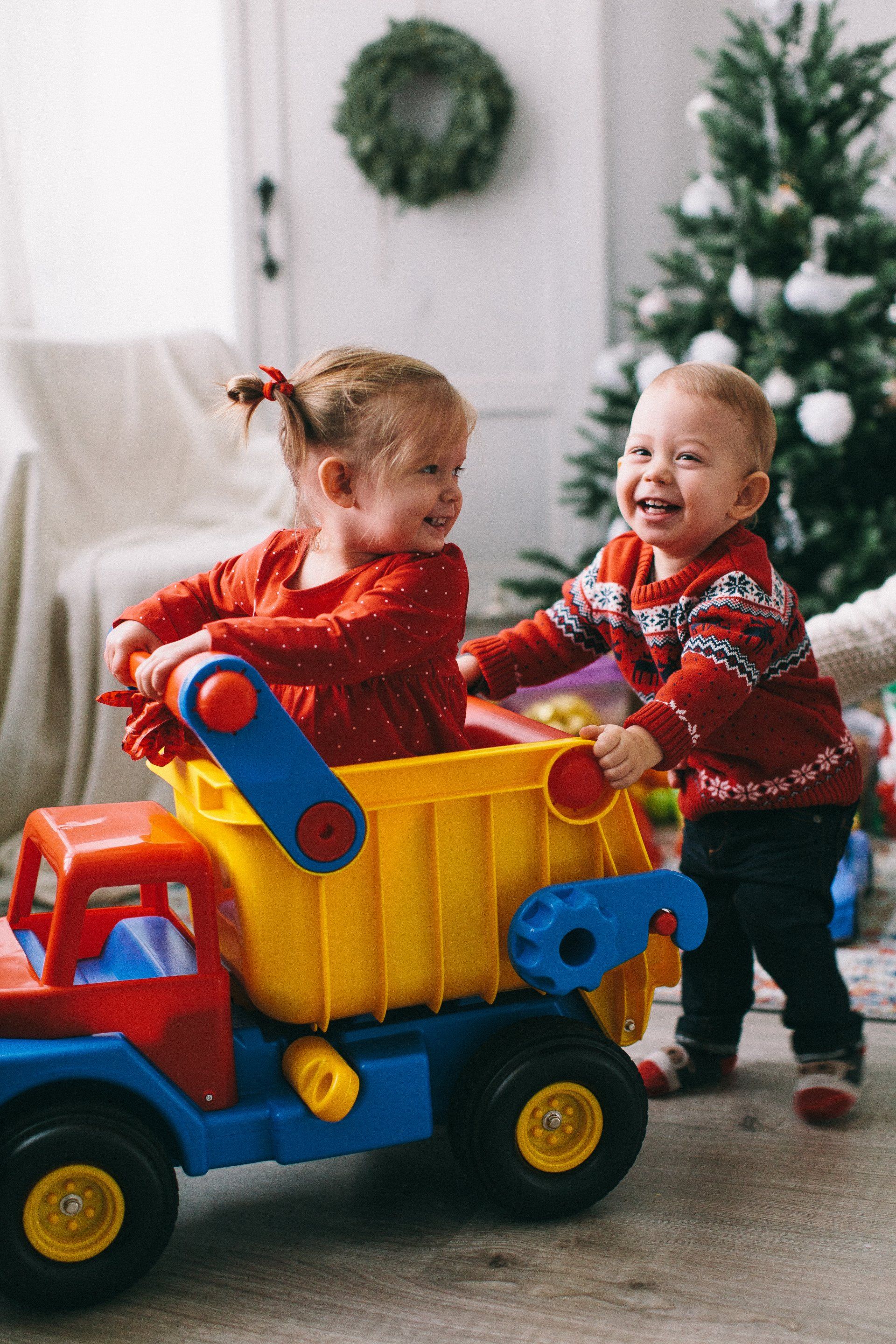 children with toy truck