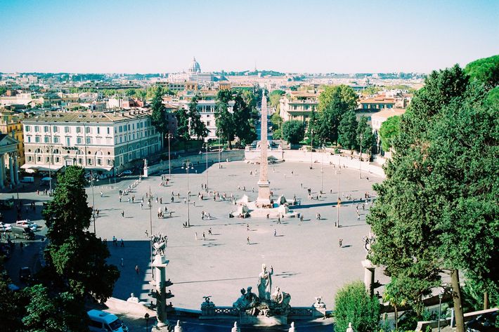 An aerial view of a large square in a city