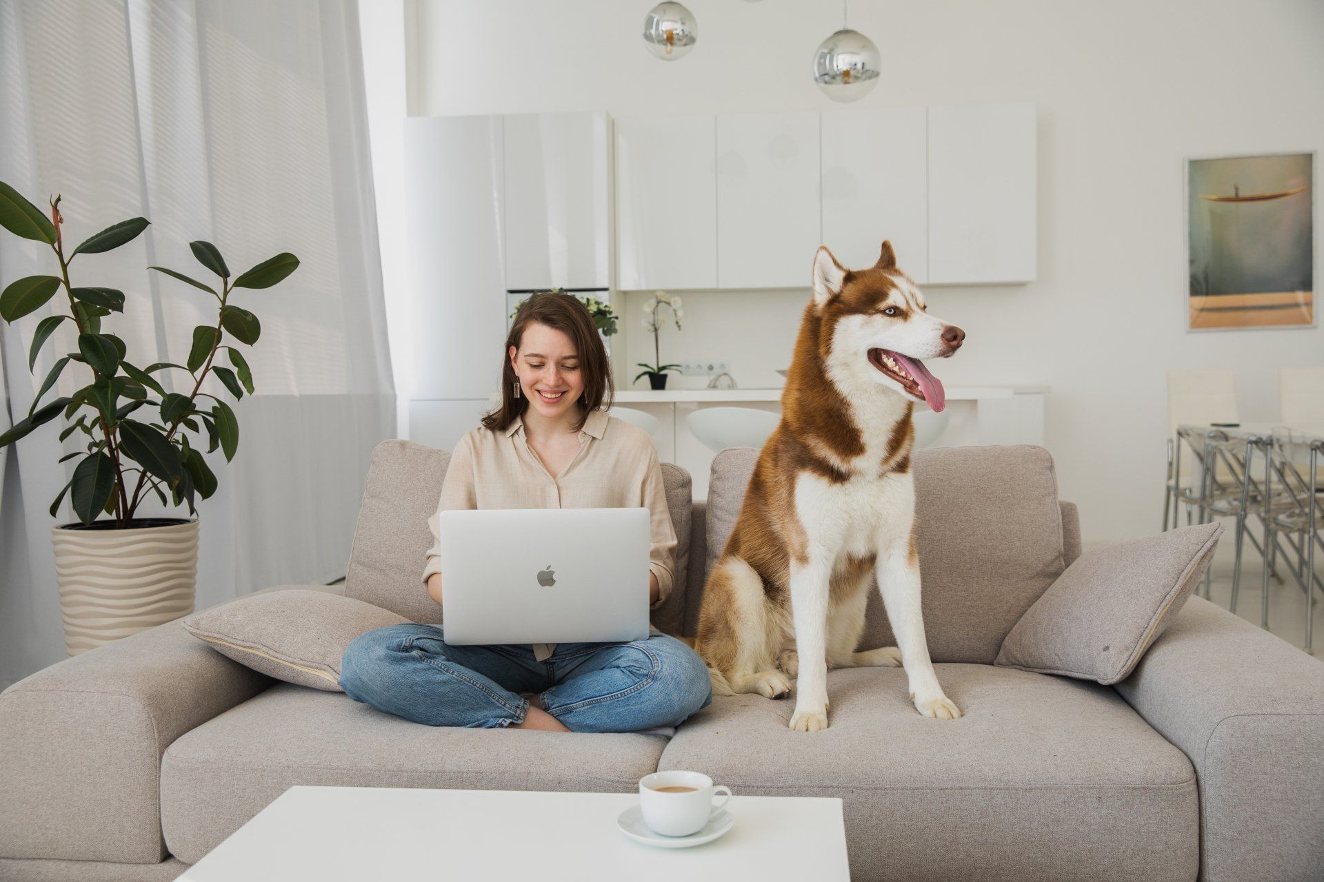 girl on couch with dog