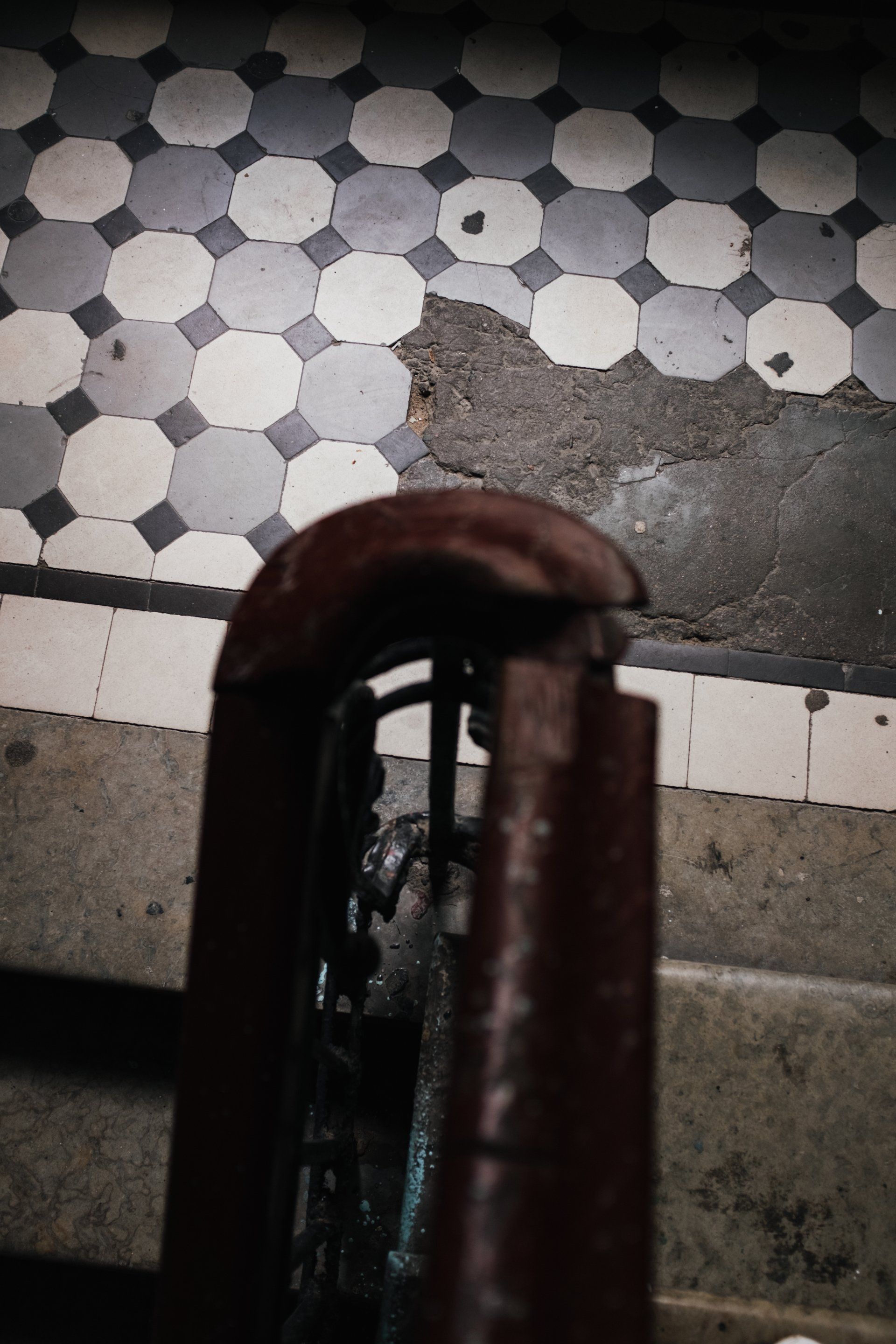 Photo of old handrail and floor