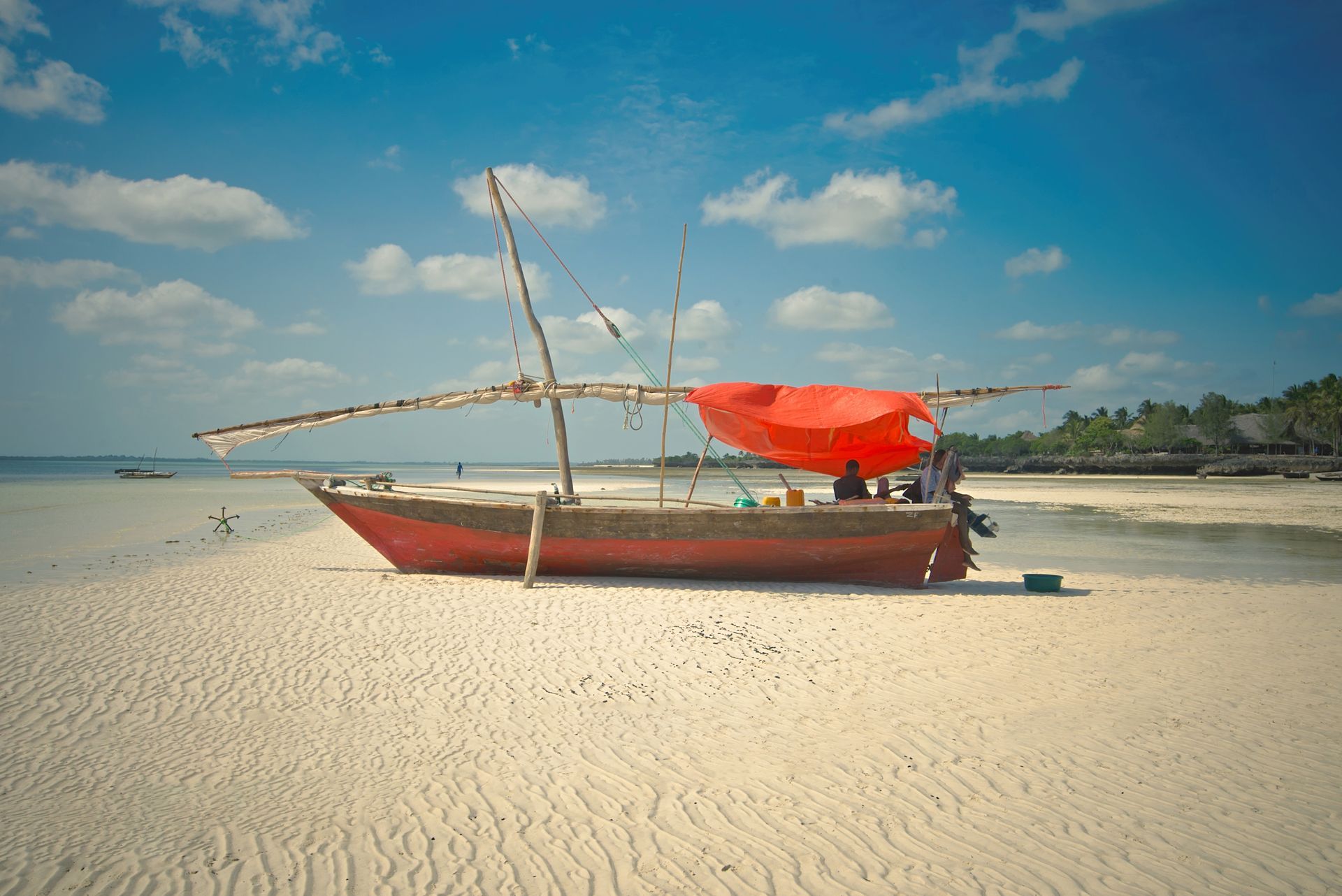 A boat stranded on the shores of a beach in Tanzania.