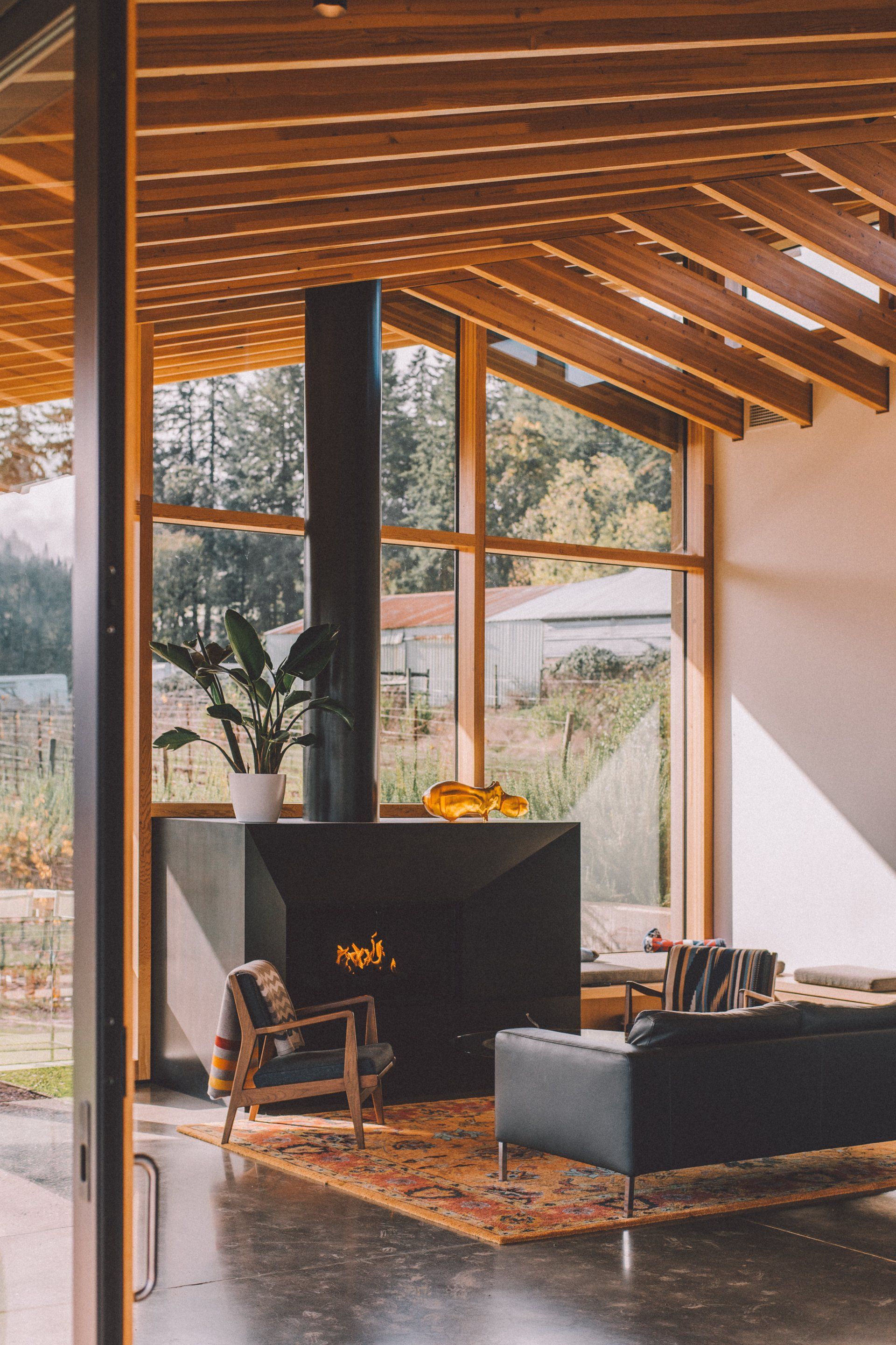 A living room with a fireplace and a couch