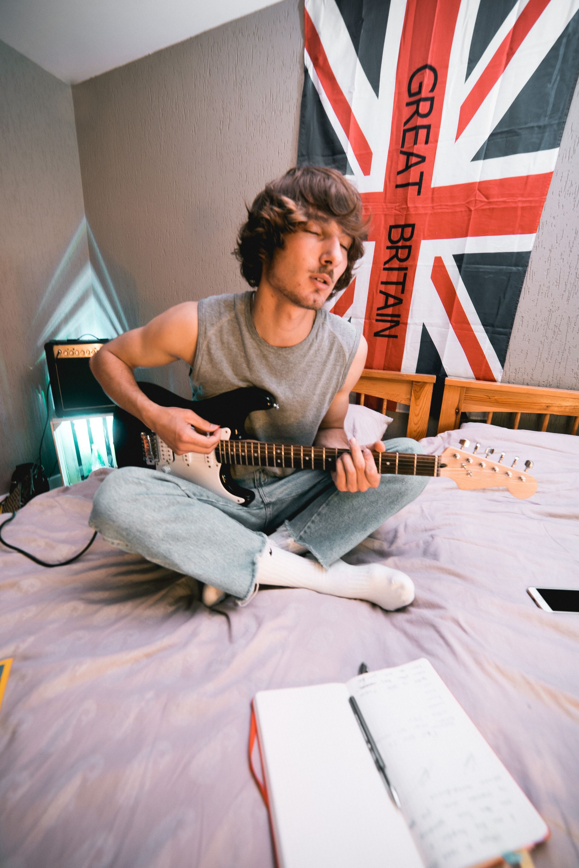 guy playing vintage guitar