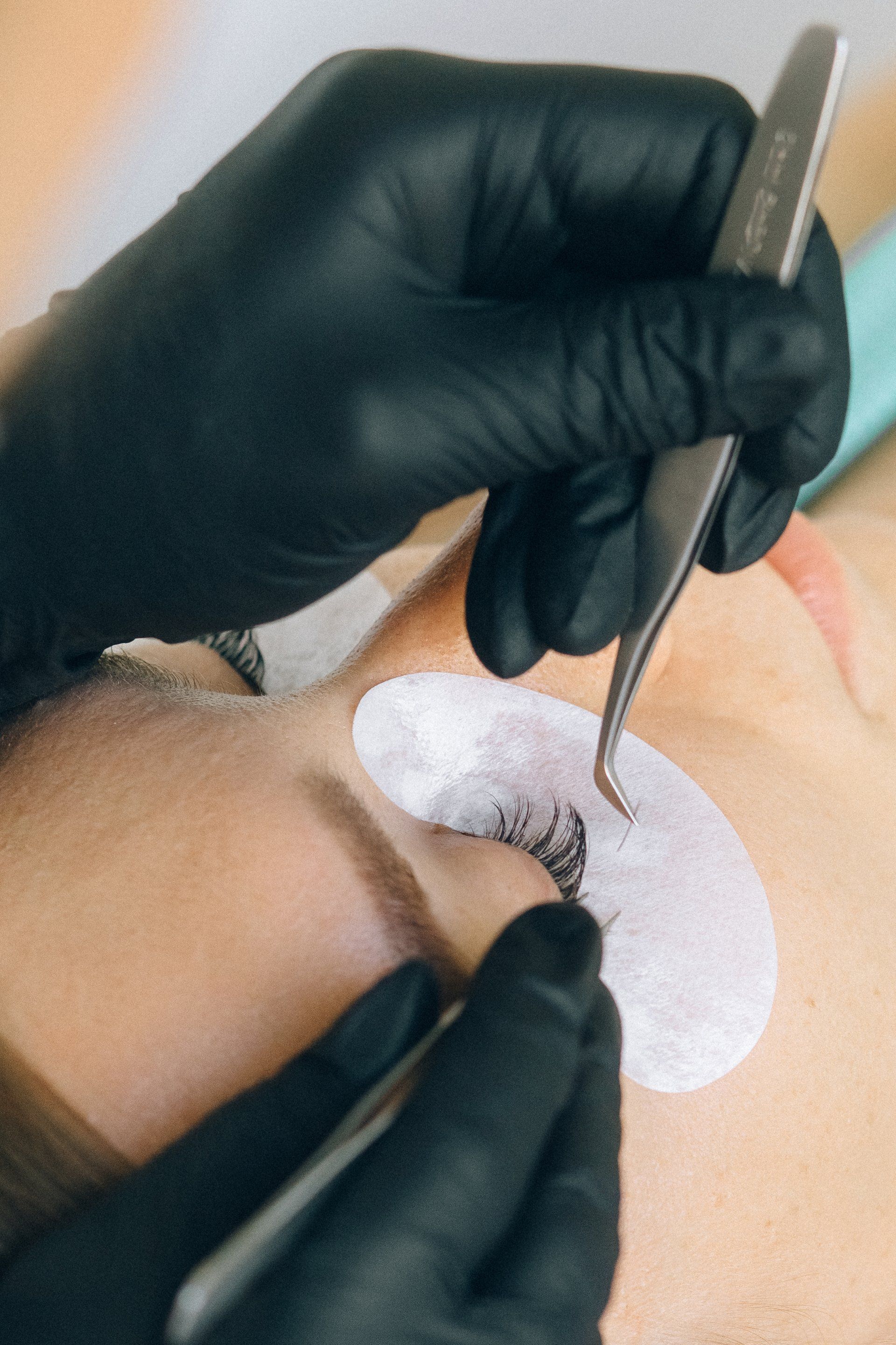 A woman getting eyelash extensions