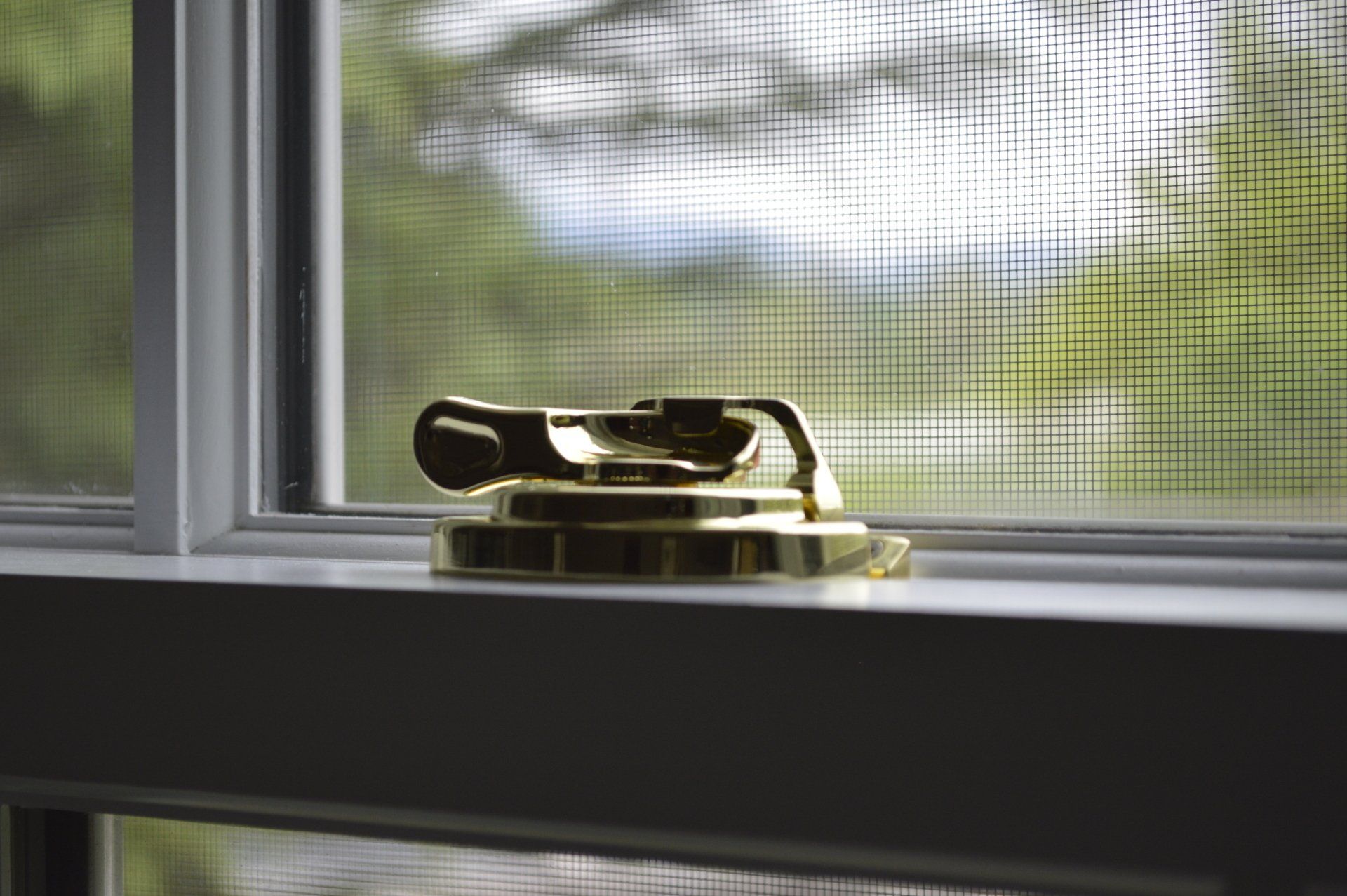 a closeup photo of a window lock