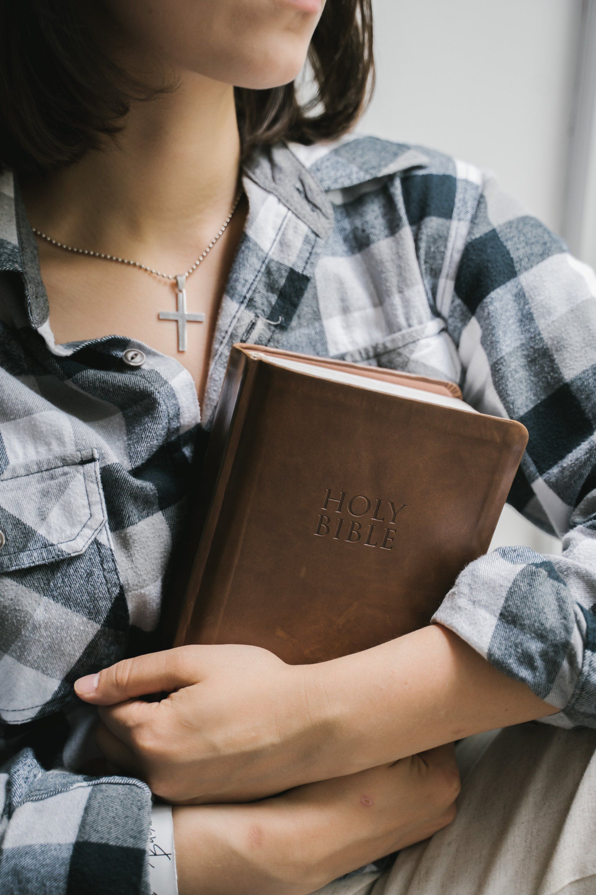 girl wearing cross