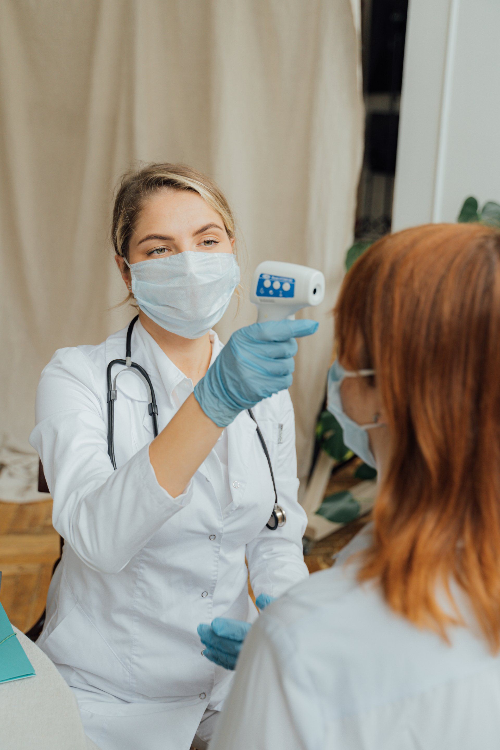 Doctor Checking Temperature