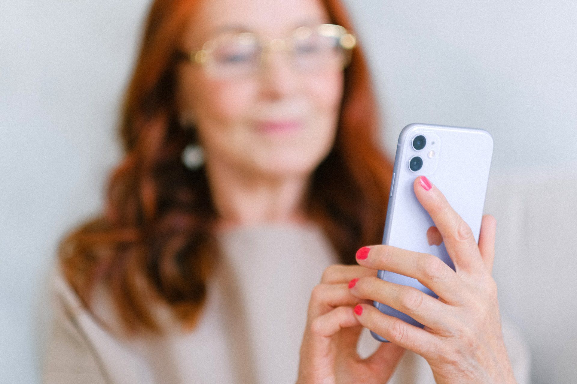 woman looking at mobile app notification