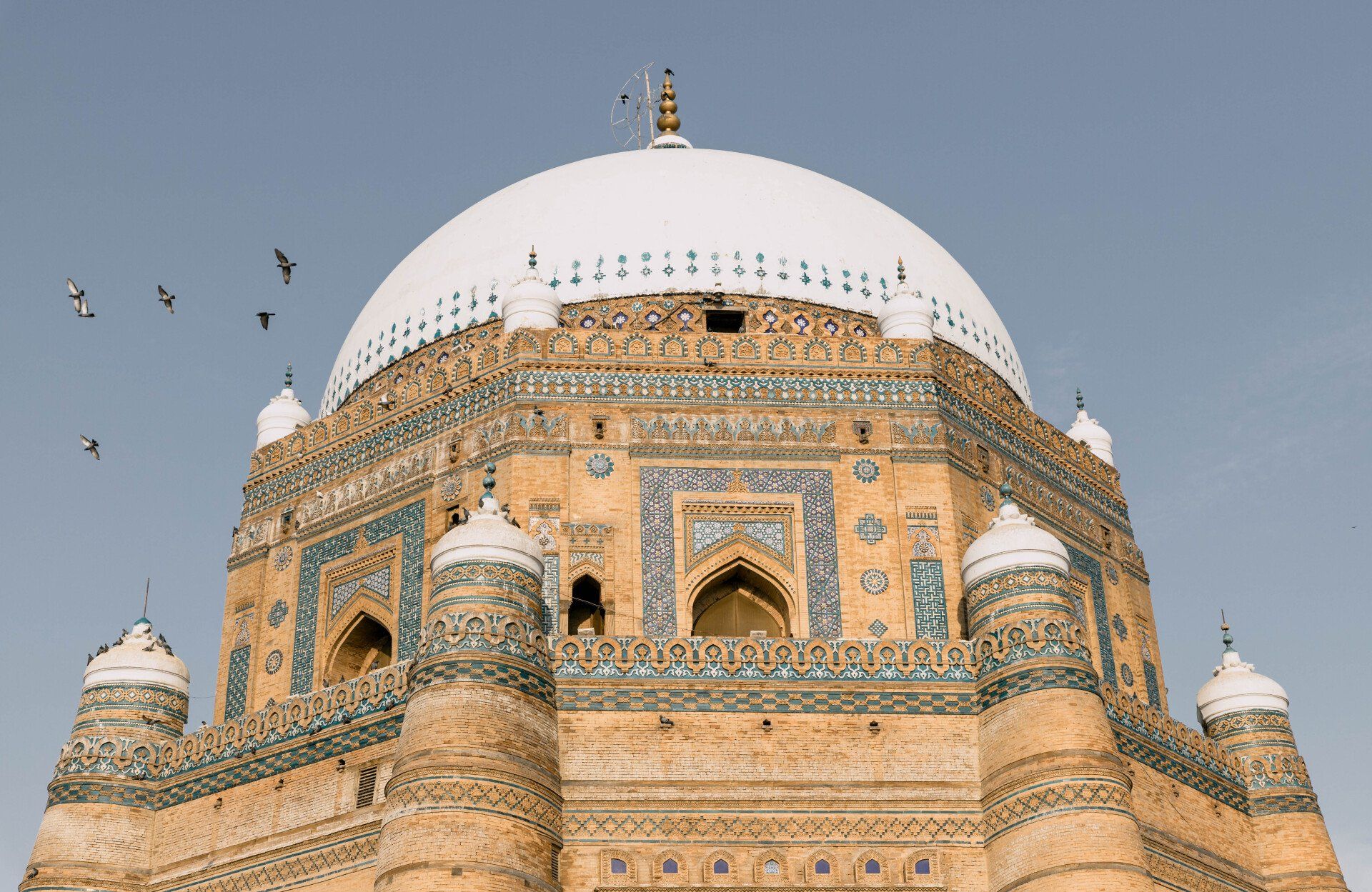 A large building with a white dome on top of it