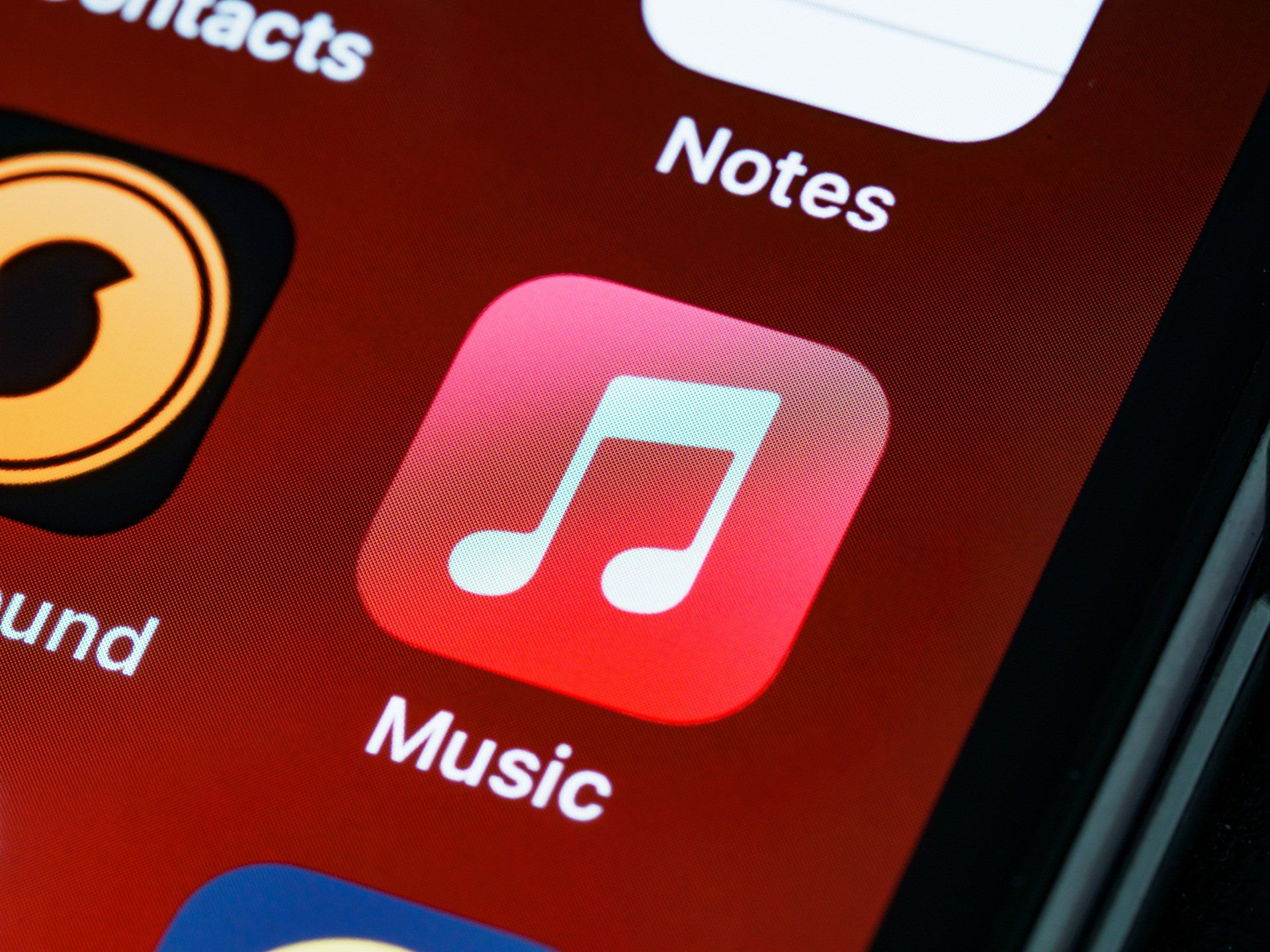 A close up of the music app on an iphone