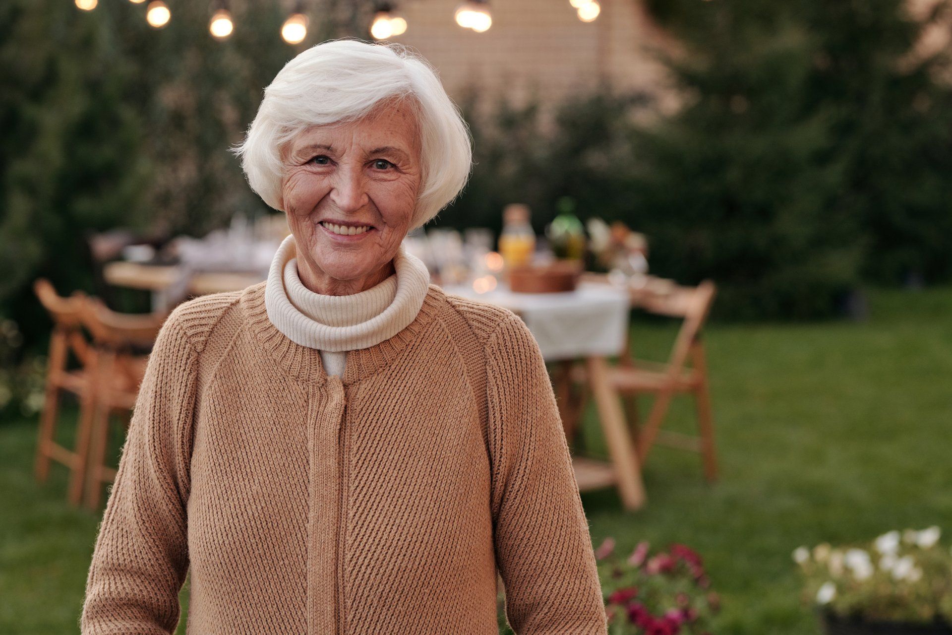 Elderly Lady Smiling With Dentures — The Denture Care Group Sunshine Coast in Caloundra, QLD