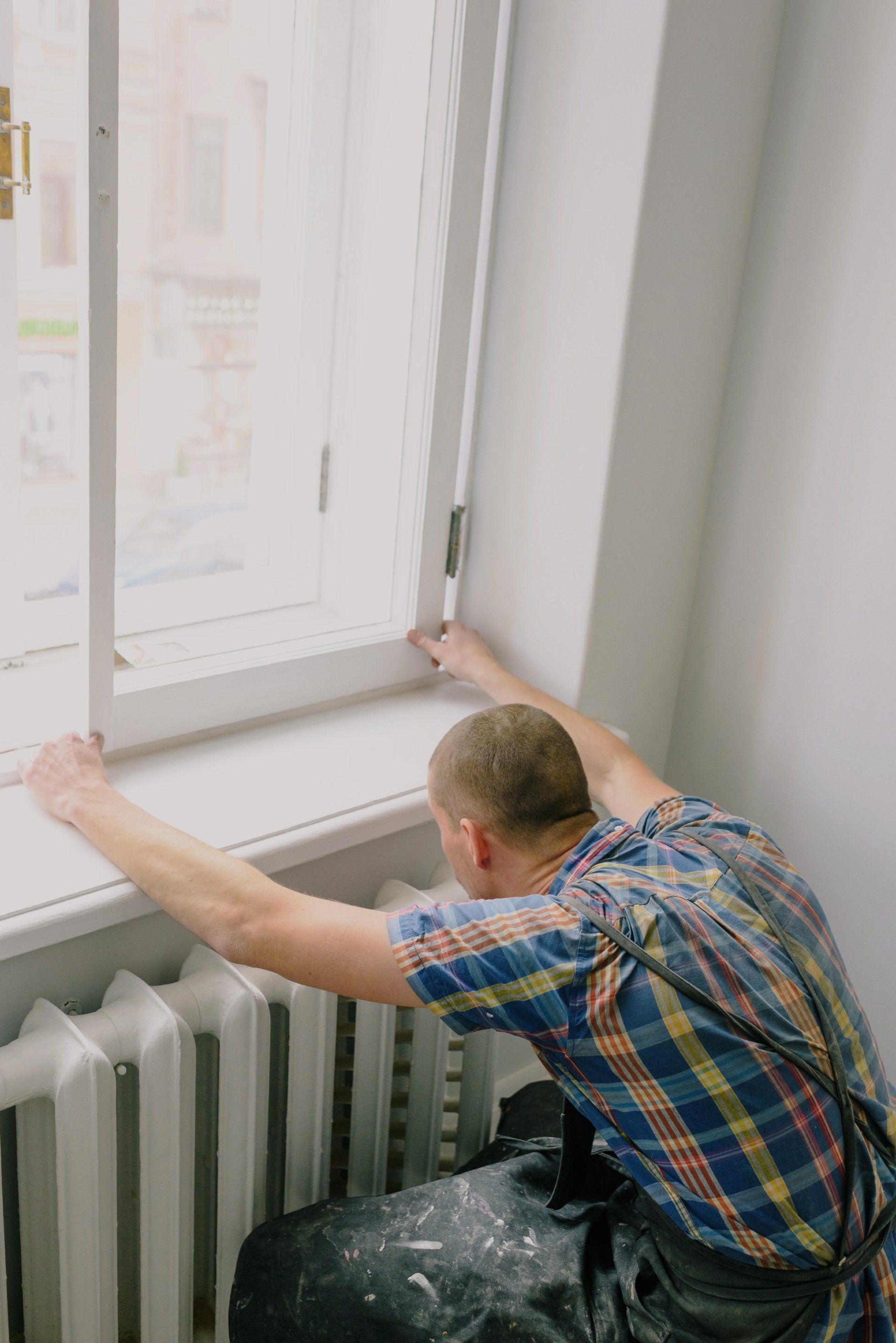 Handyman Installing A Window in Ocean County NJ Handyman Window Installer in Ocean County NJ