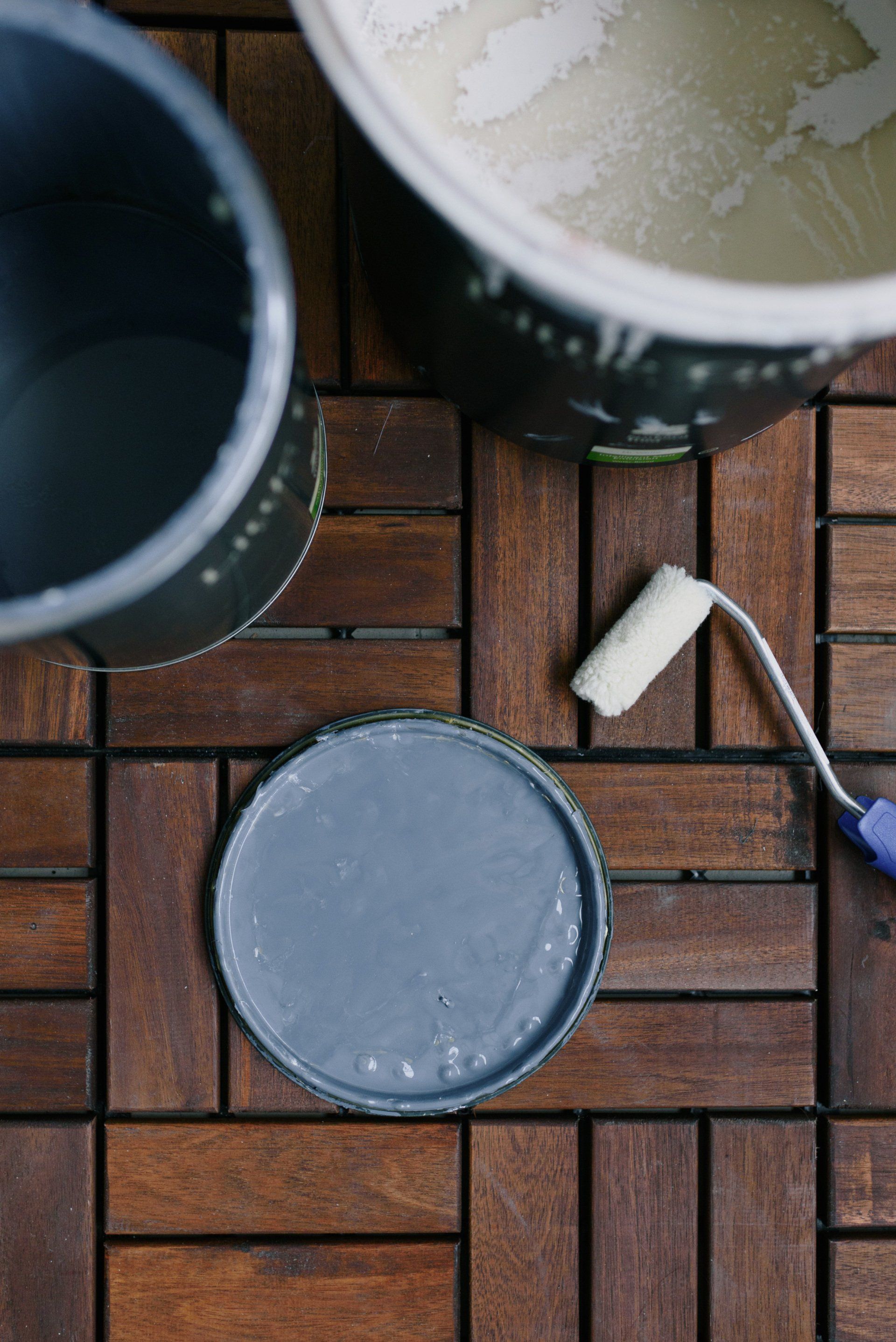 can of blue-gray paint