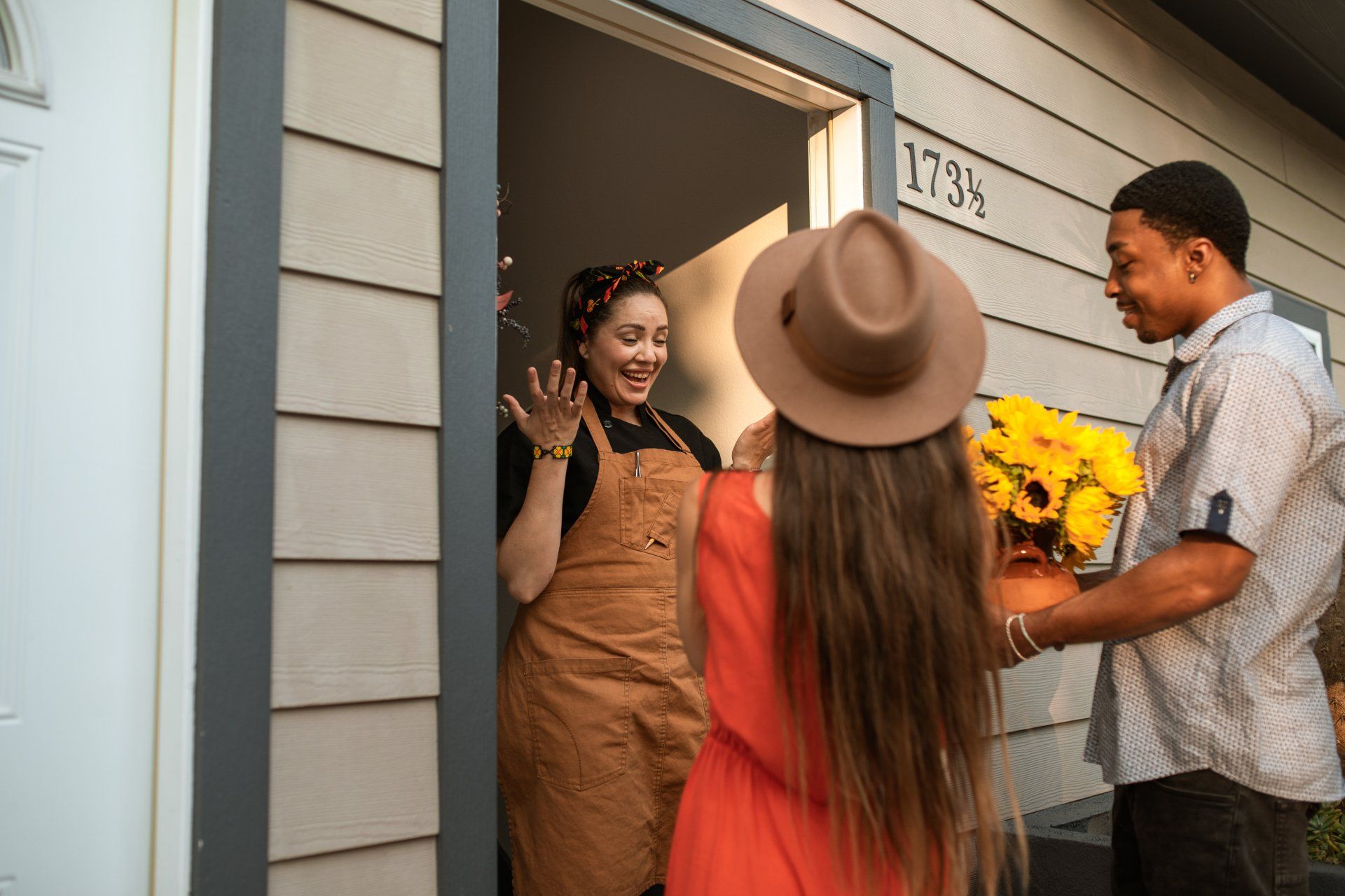 a woman welcoming guests