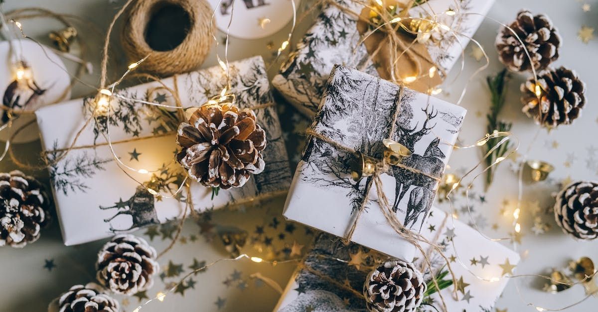 gifts with pinecones and lights on them