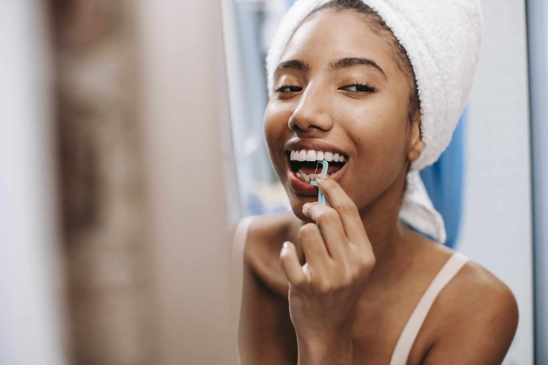 Happy patient after successful dental implant procedure