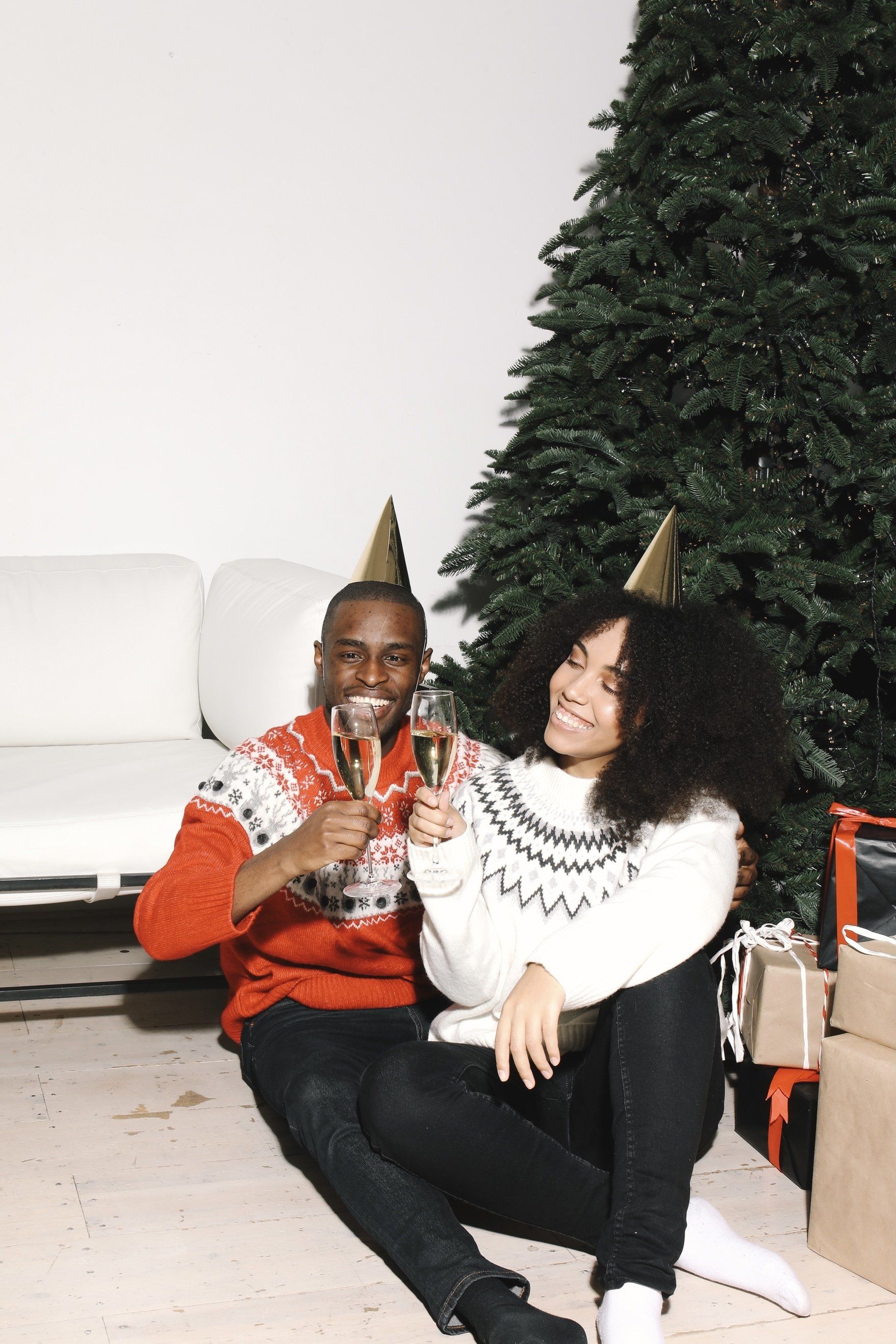 couple under christmas tree