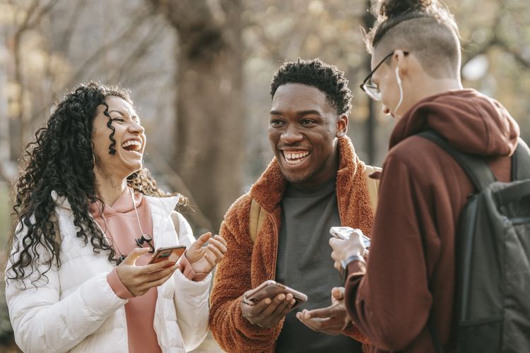 Young adults laughing