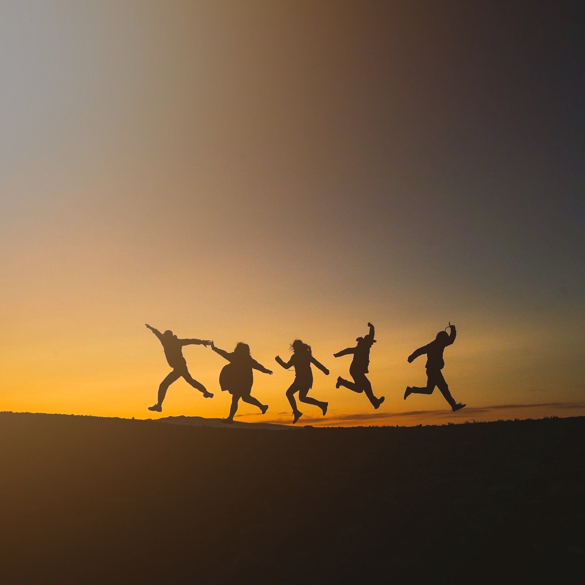 group of people moving joyfully