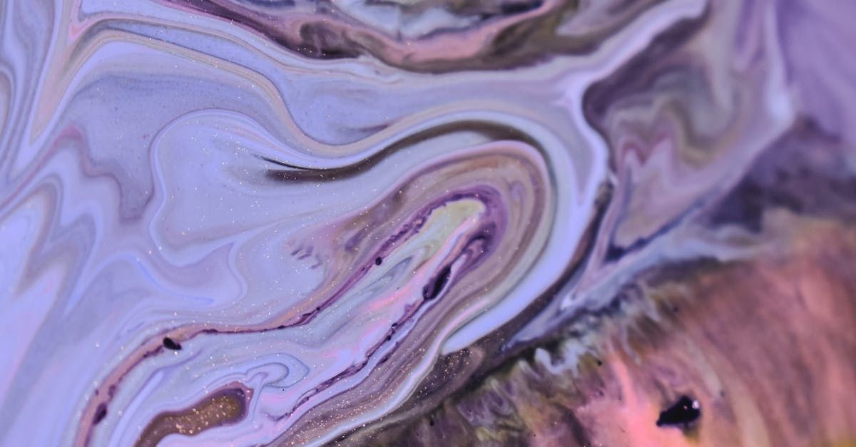 A close up of a purple and pink marble painting.