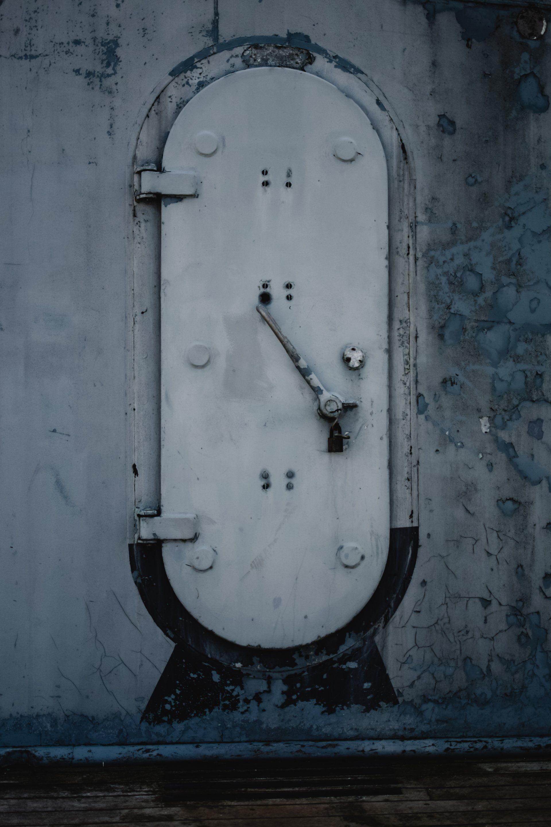 An arched door on the wall of the crawl space refer to waterproofing by providing access.