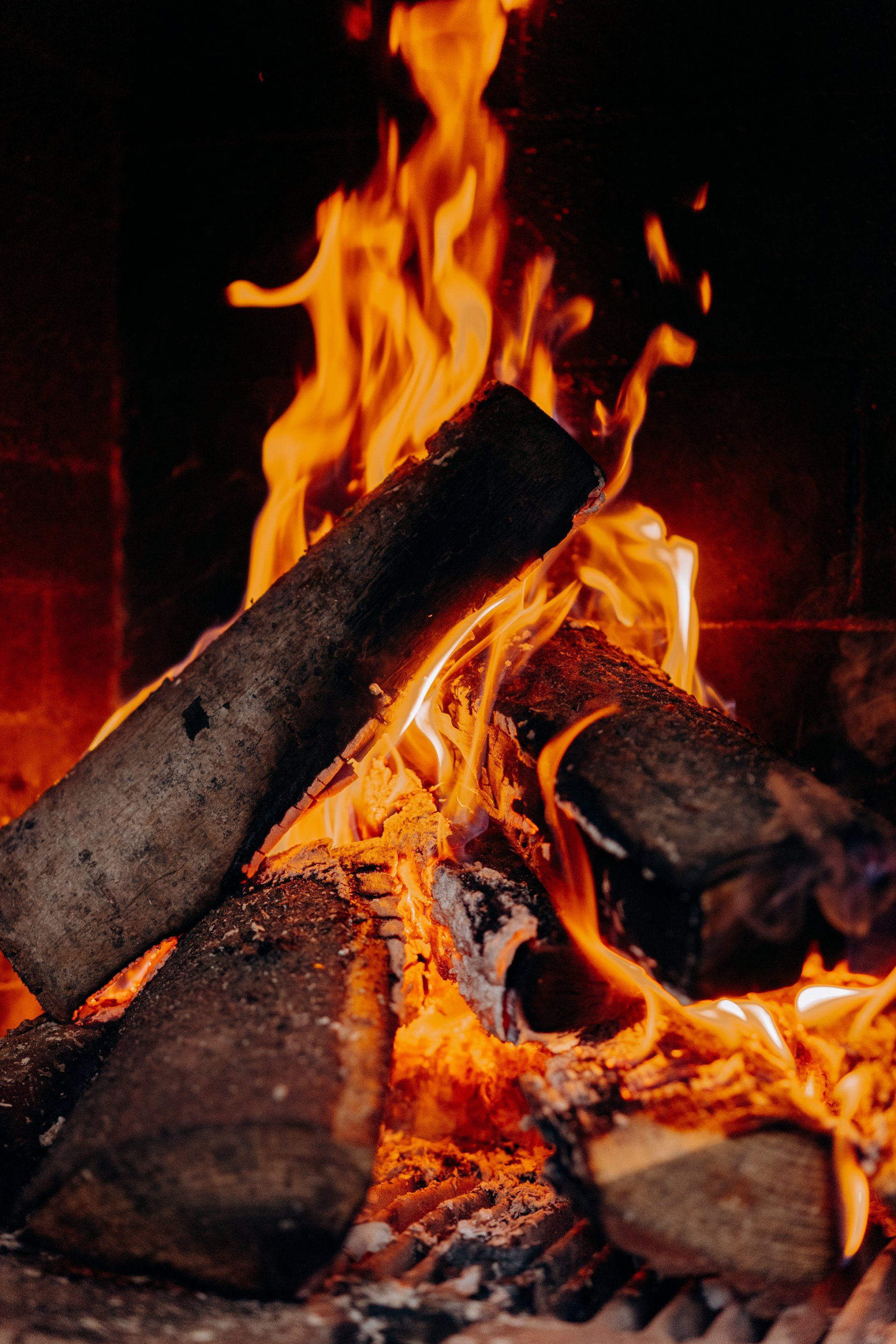 logs burning on a fireplace