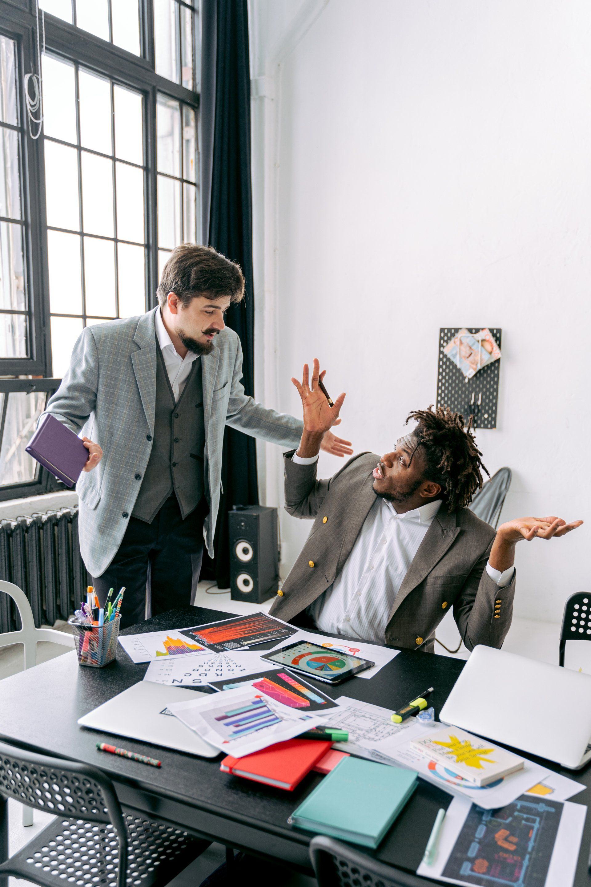 Two men arguing in an office