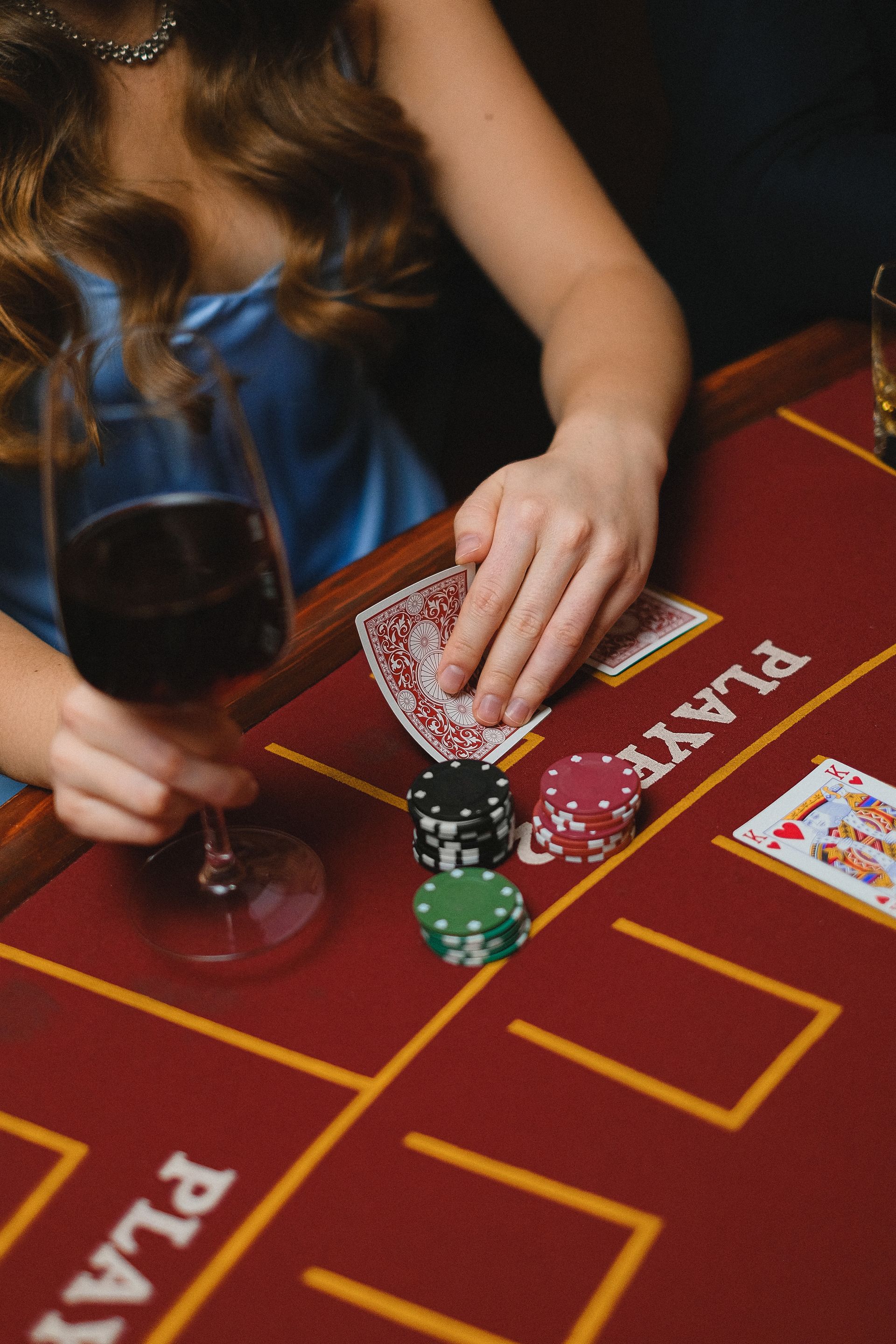 Enjoying a adult beverage at a casino night.