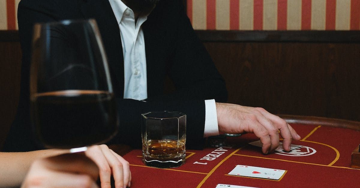 man gambling drinking