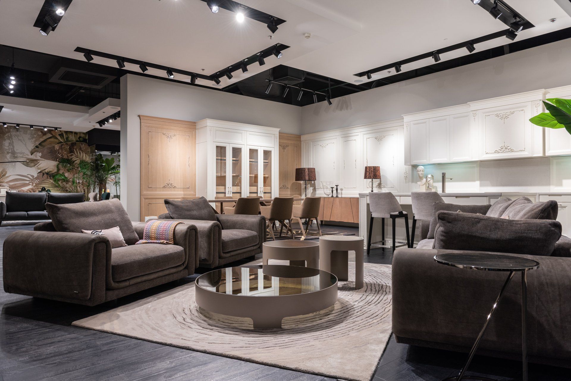 A living room filled with furniture and a round coffee table.