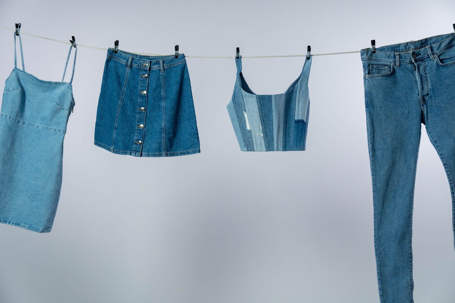 denim pieeces on a clothes line for denim day