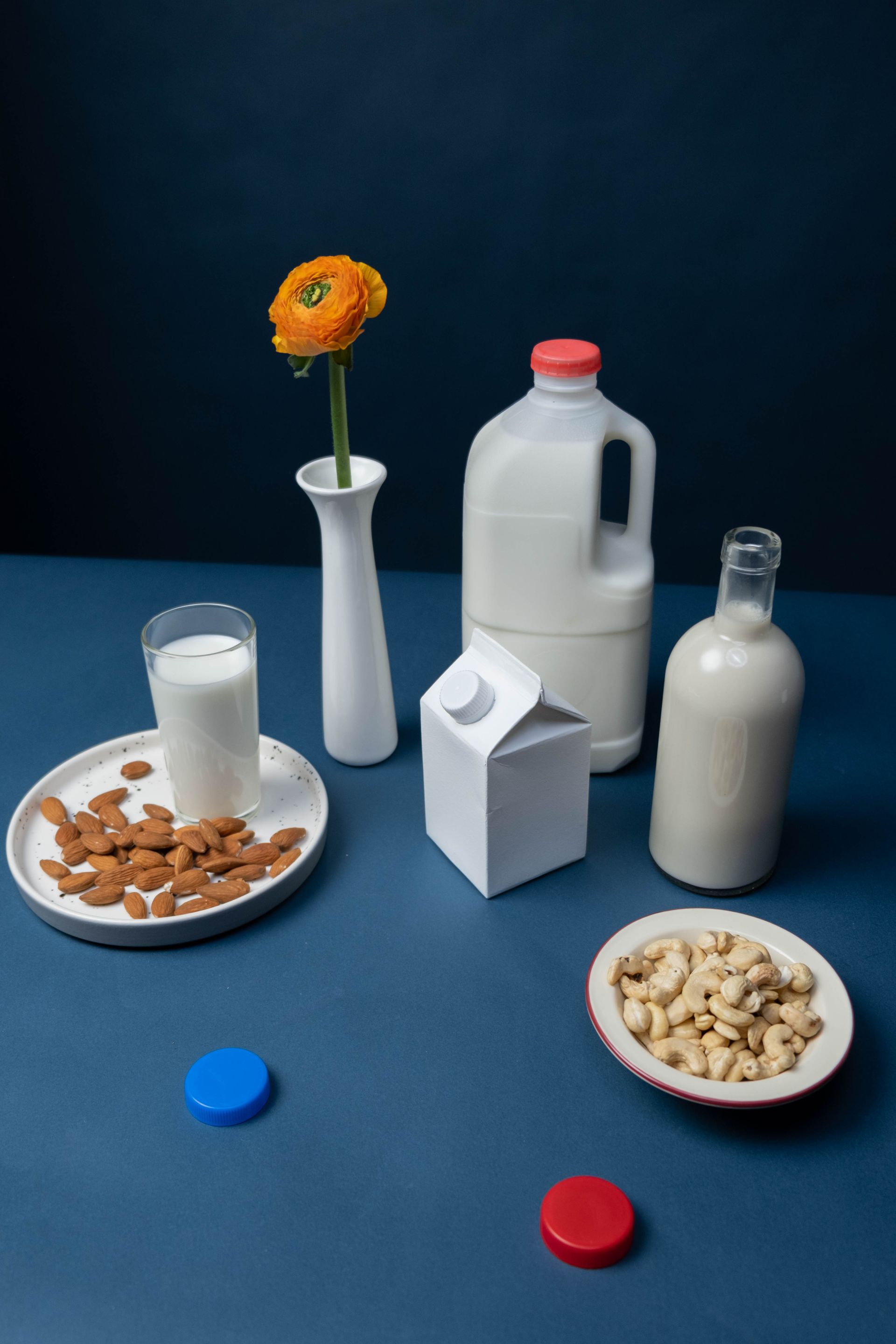 There are many different types of milk on the table.