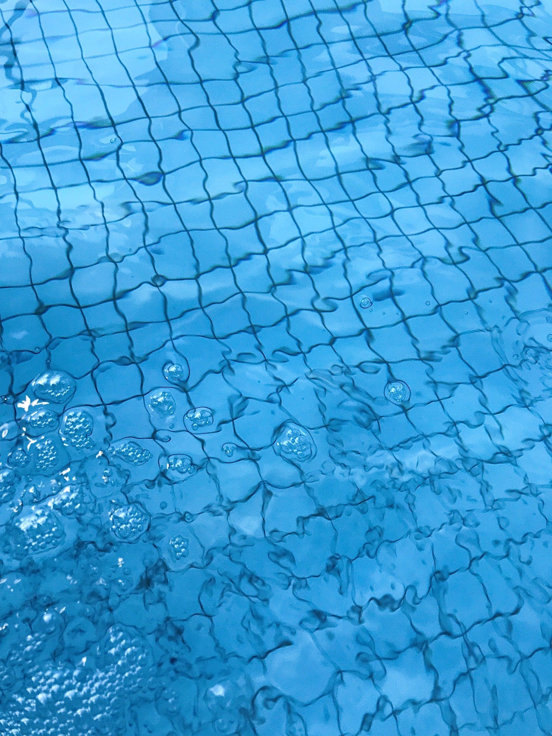 Pool liner shown through clean clear water