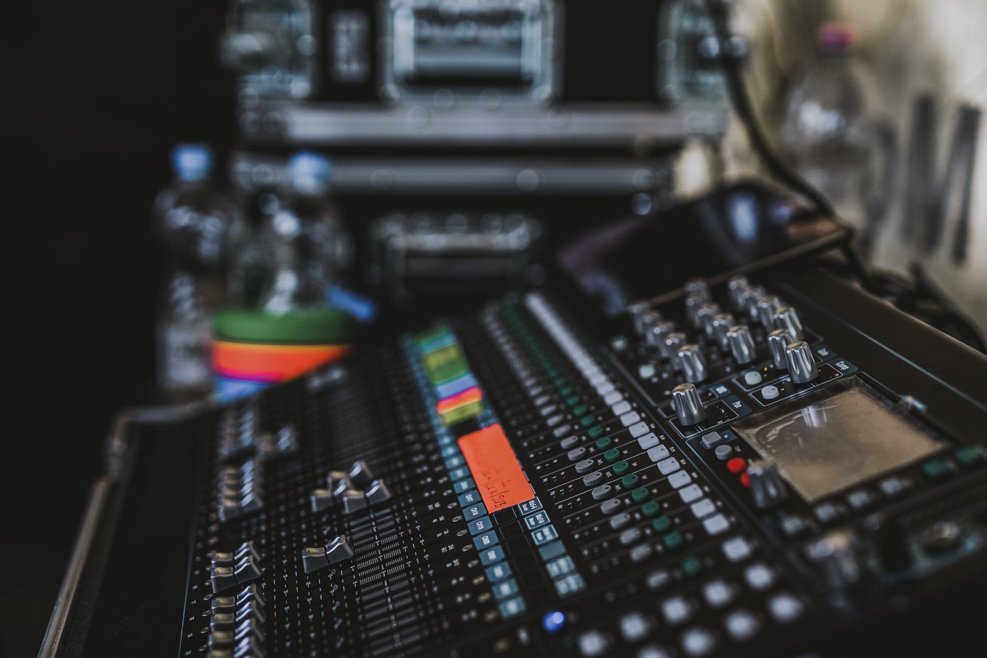 A close up of a mixer in a dark room.