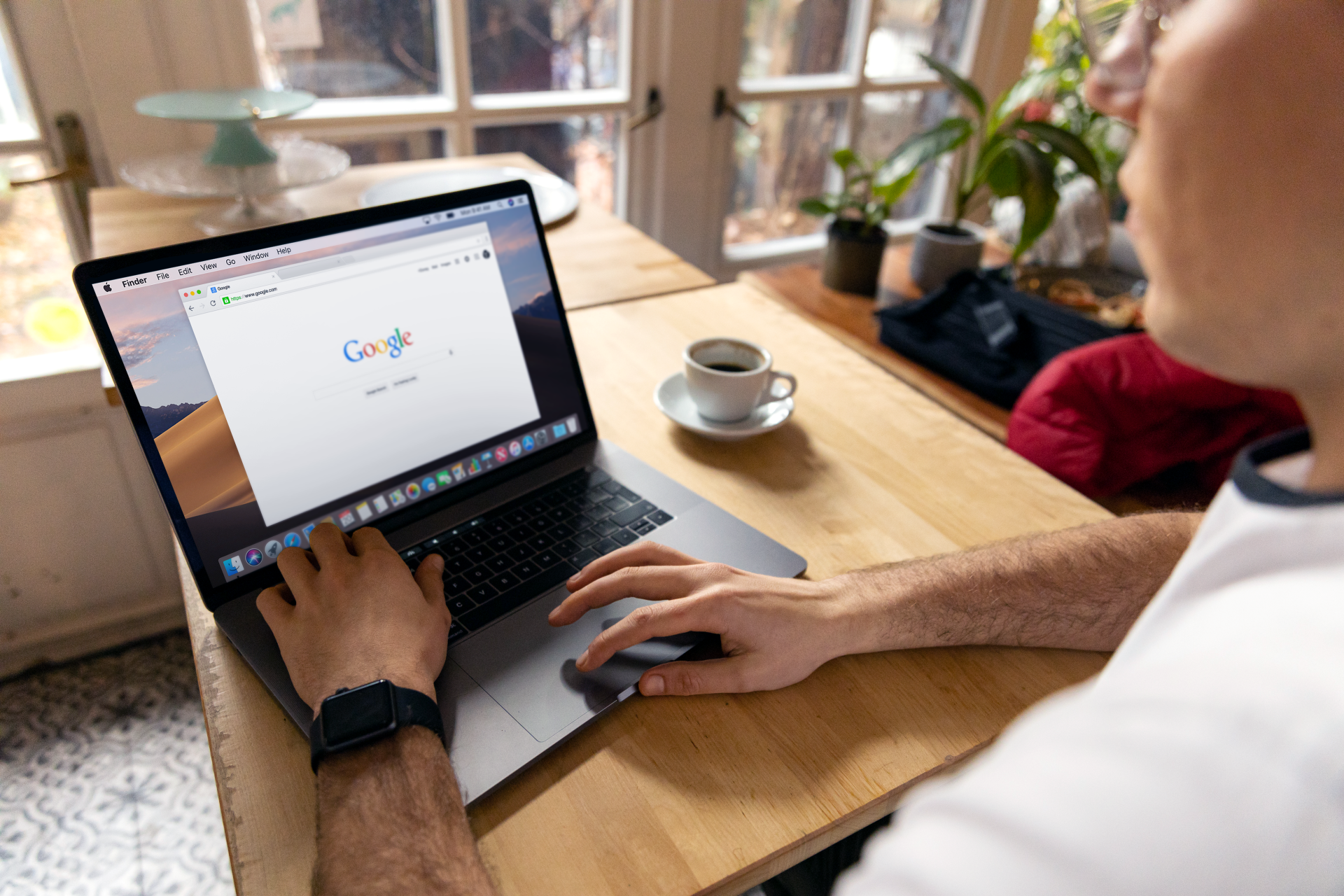 Person working on Google search campaigns on a laptop