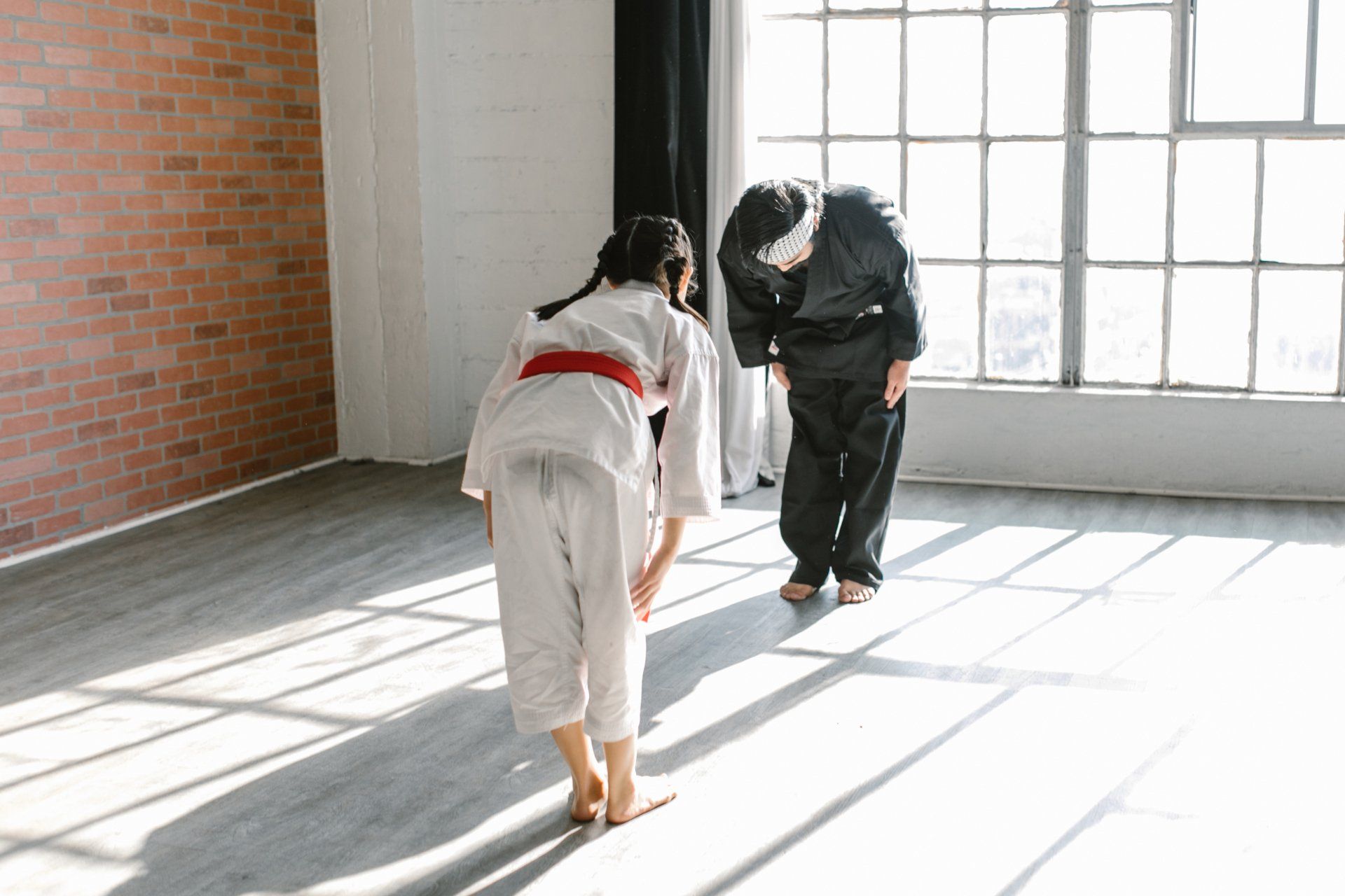 two guys bow in martial art.