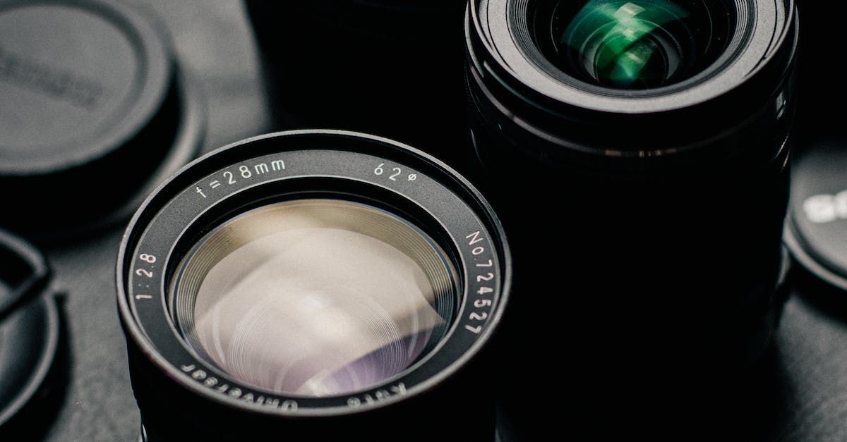 A close up of a camera lens on a table.